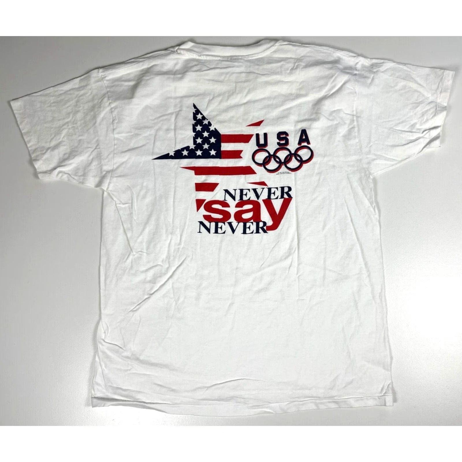 Champion Vintage Champion Never Say Never USA Olympics T-Shirt Made in USA Sz XL Men White 90s Sports 100% Cotton Short Sleeve Crew Neck Graphic Double-Sided Size US XL / EU 56 / 4 - 2 Thumbnail