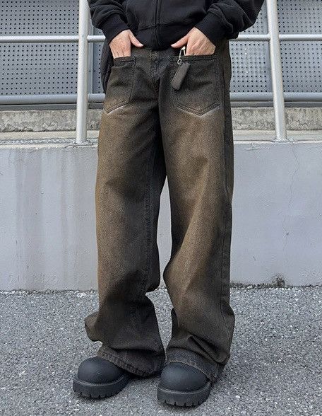 Avant garde reverse front dirty mud dyed jeans pants