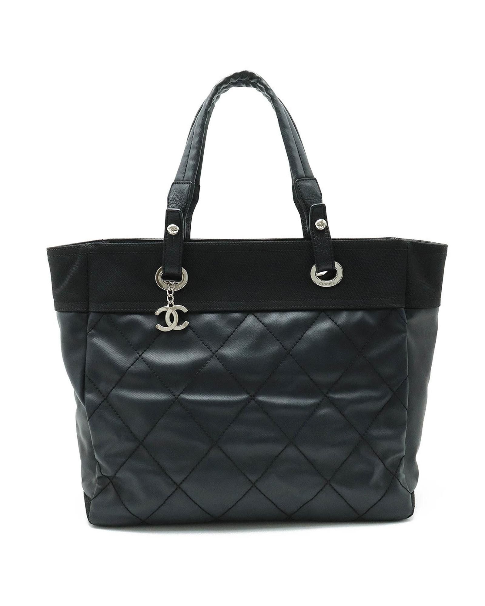 image of Chanel Elegant Black Canvas Handbag With Timeless Design And Exceptional Craftsmanship, Women's