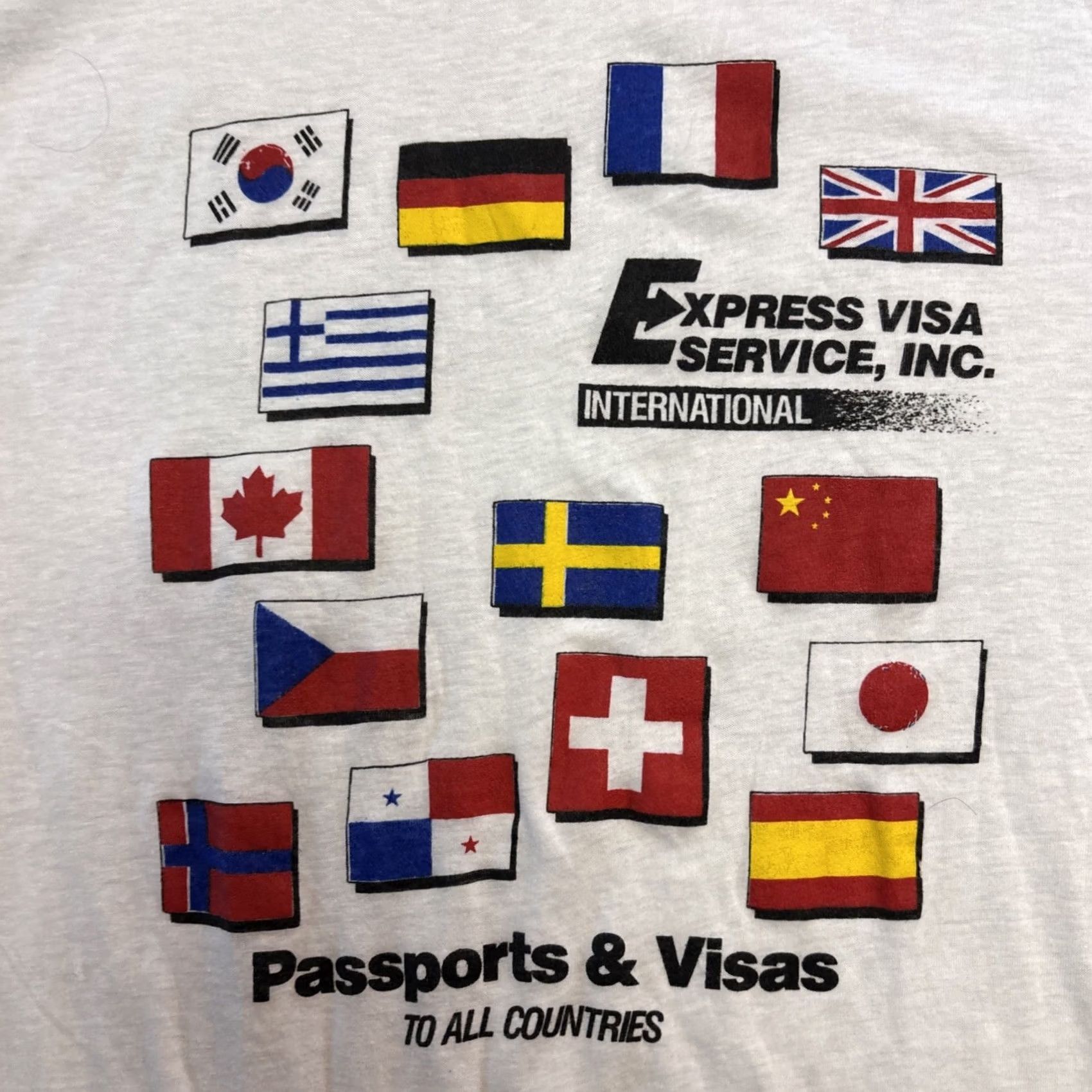 Vintage VINTAGE Ebert Sportswearvisas And Passports T Shirt Men’s XL White Graphic Trace Mens XL White T Shirt Size US XL / EU 56 / 4 - 2 Thumbnail