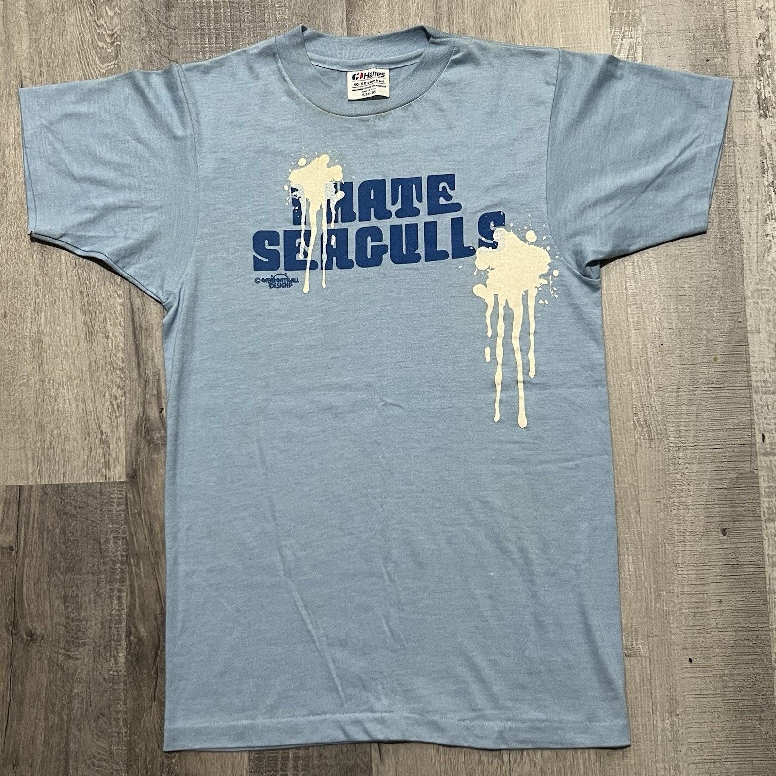 Hanes VTG 1980s "I Hate Seagulls" Blue Bird Poop Beach T Shirt Size US S / EU 44-46 / 1 - 1 Thumbnail