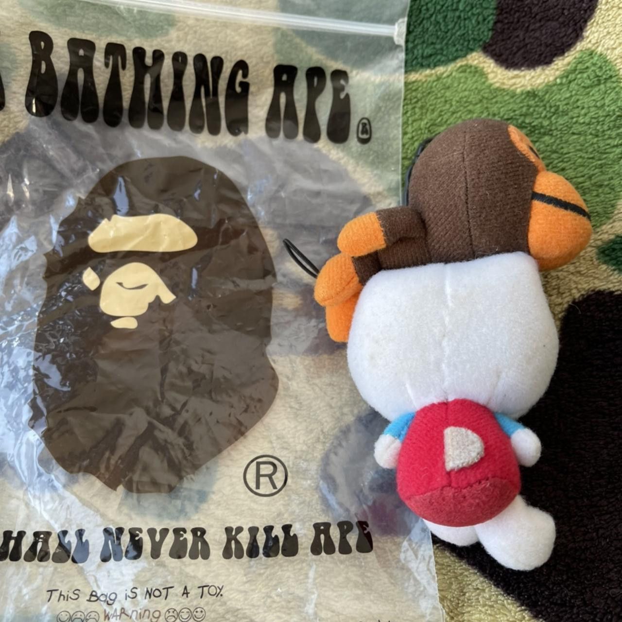 Bape Bape x Hello Kitty Baby Milo Keychain | Grailed