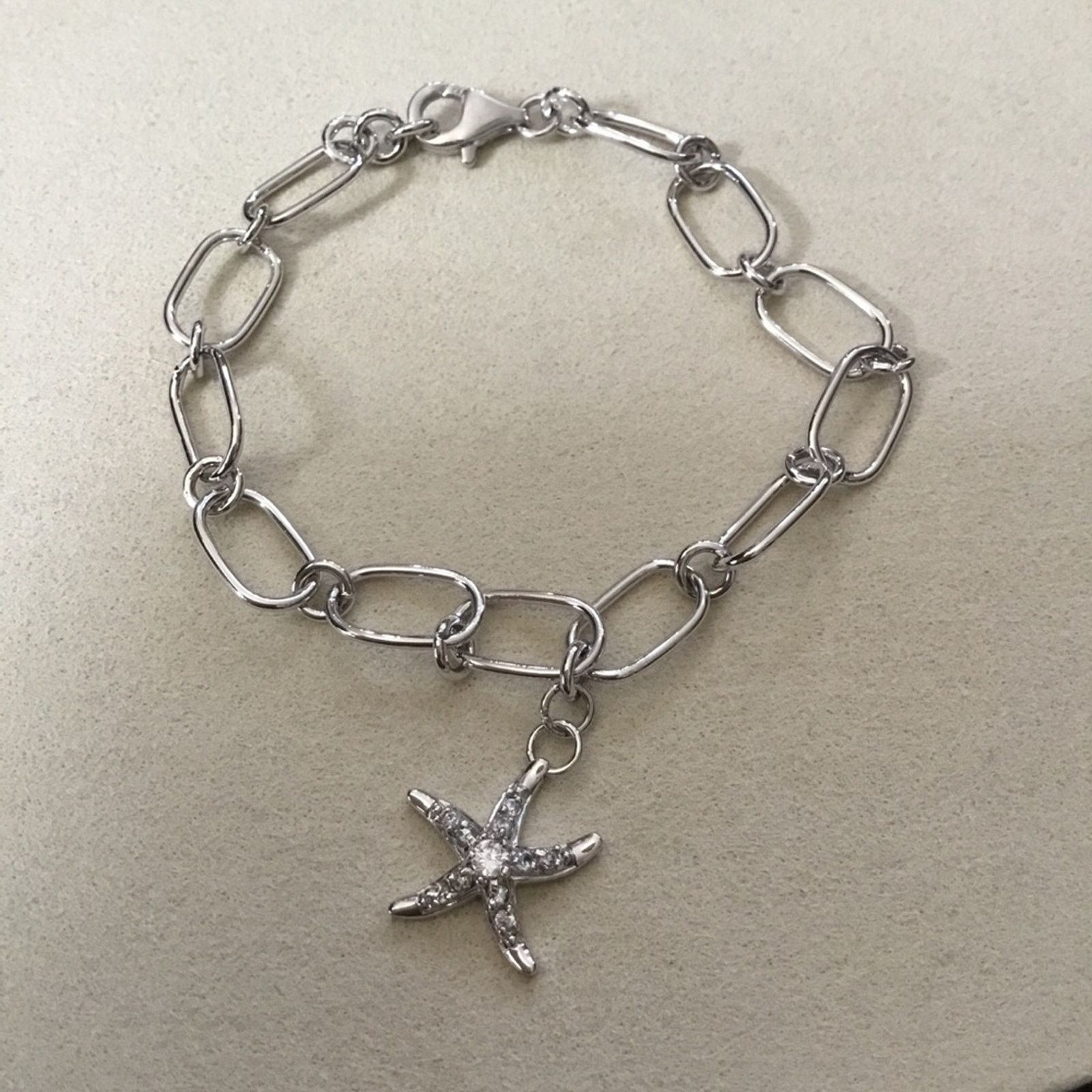 Other Silver Classic Multi-Chain with Starfish Bracelet Size ONE SIZE - 1 Thumbnail