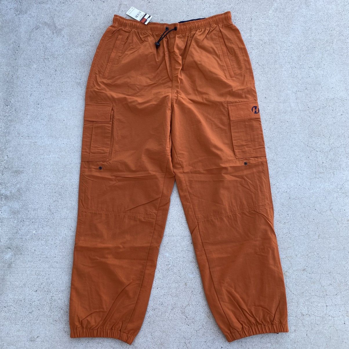 Tommy Hilfiger Vintage Tommy Hilfiger Cargo Nylon Track Pants Orange New Size US 36 / EU 52 - 1 Thumbnail