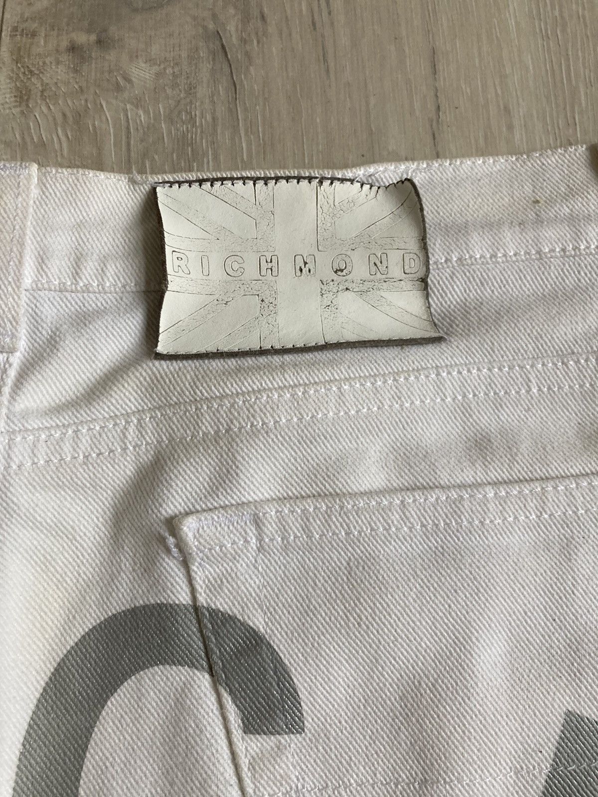 John Richmond RICH white and silver flared jeans