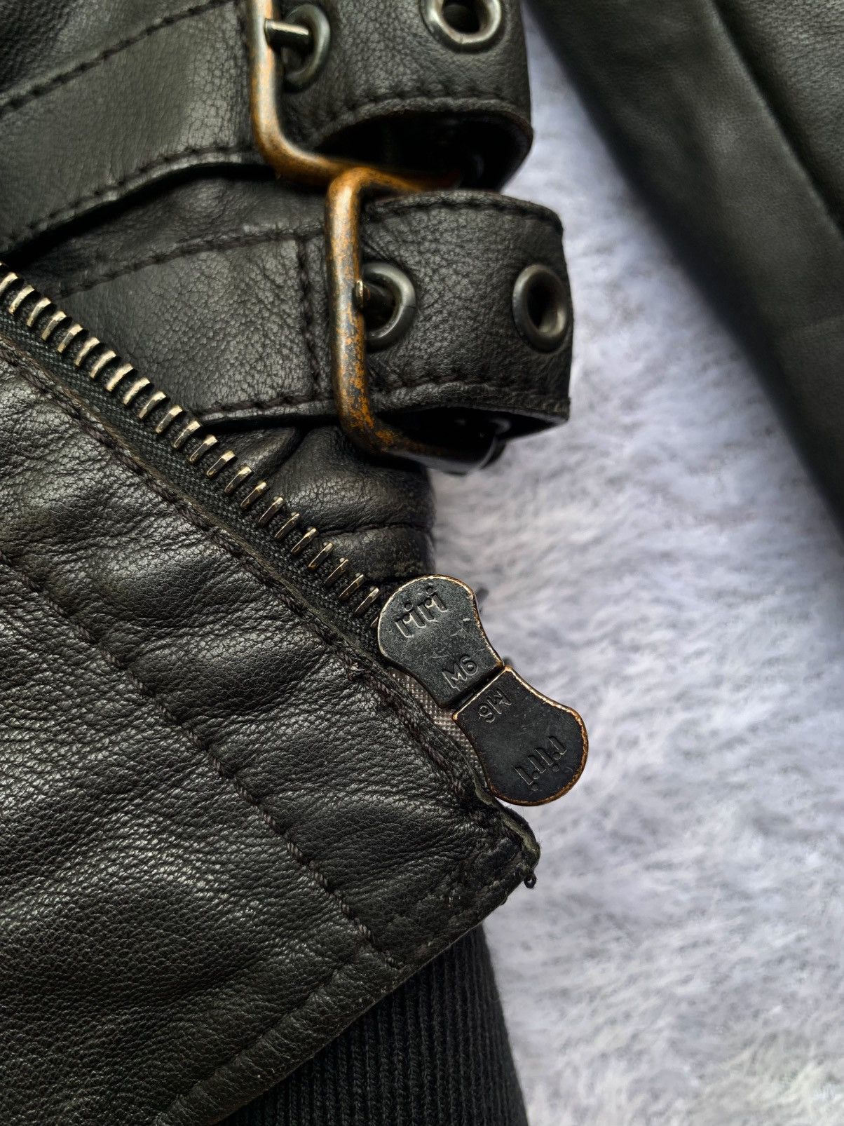 Laced up military leather jacket