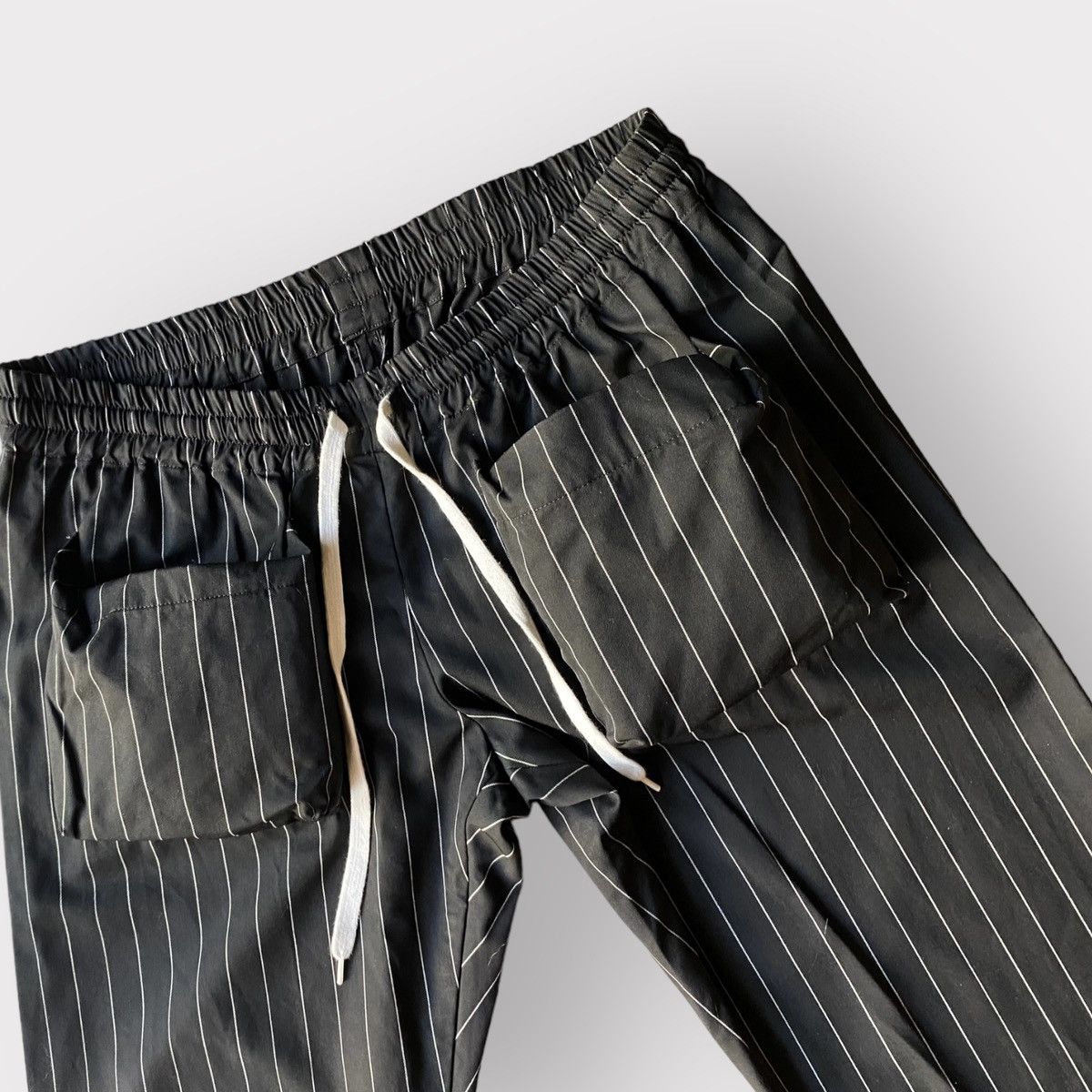 image of Number N Ine x Takahiromiyashita The Soloist Number (N)Ine Wool Stripe Drawstring Cargo Pants in Bl