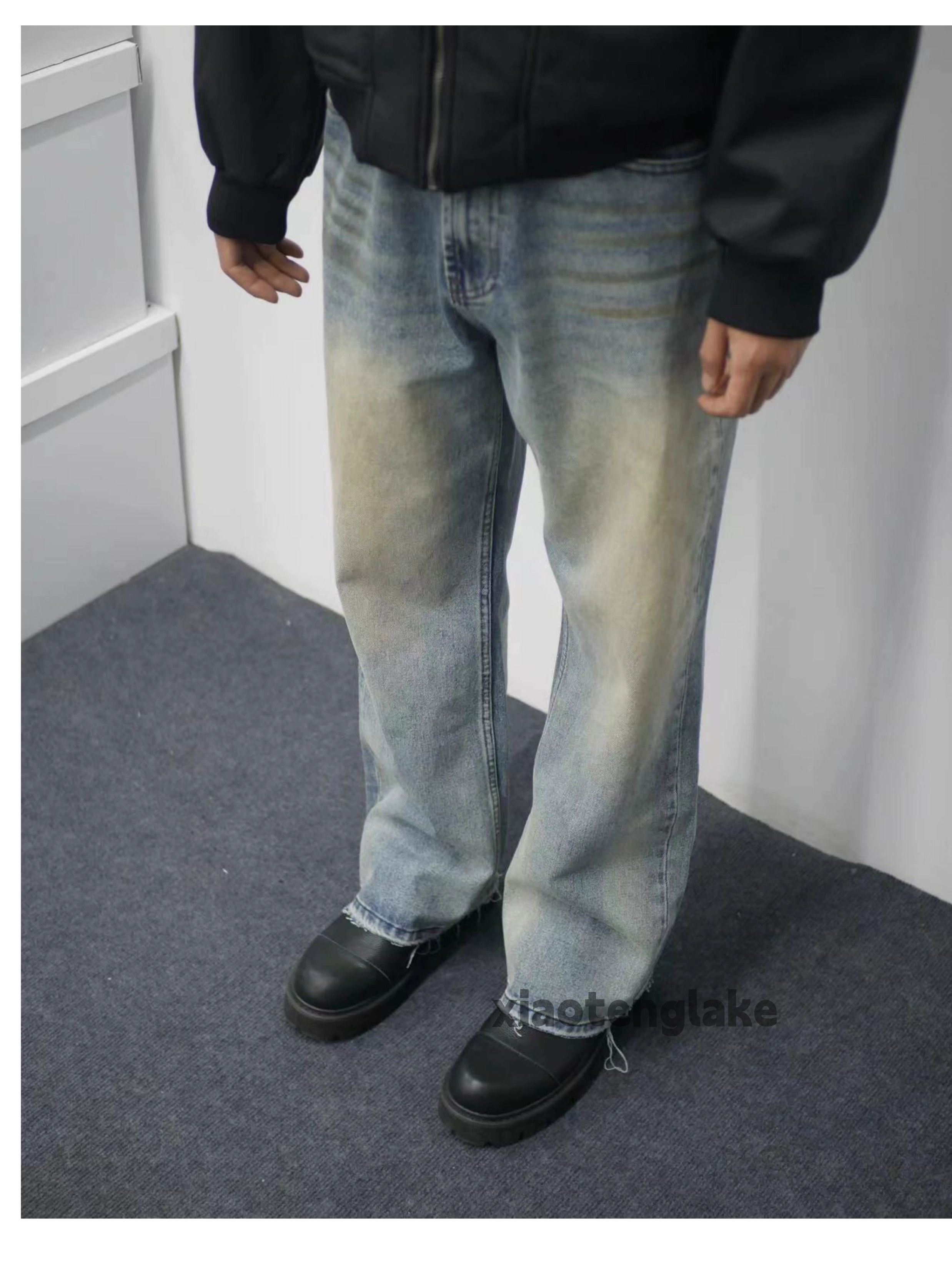 washed faded damaged rusty stain loose jeans