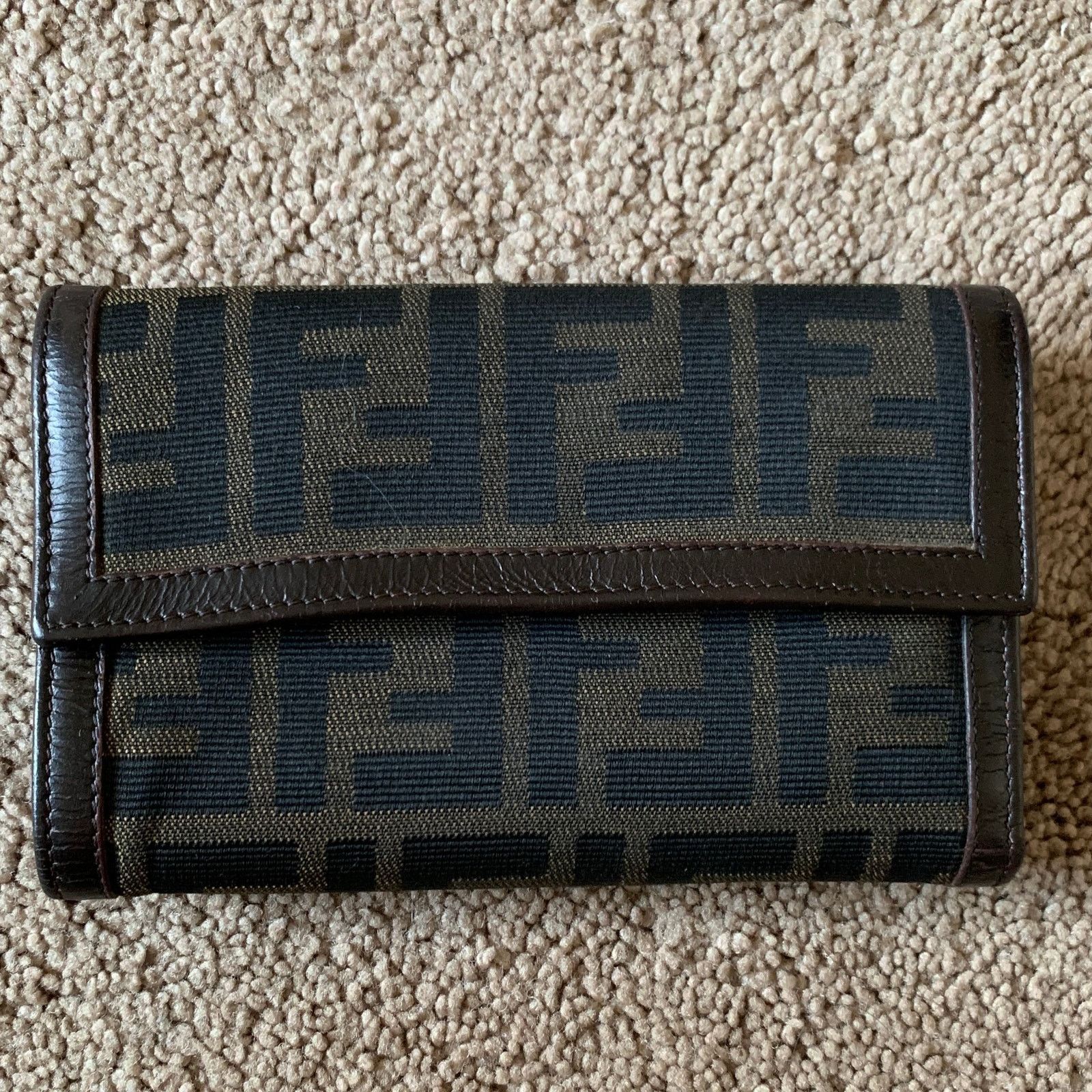 F1058 Fendi women's zucca monogram and brown leather wallet