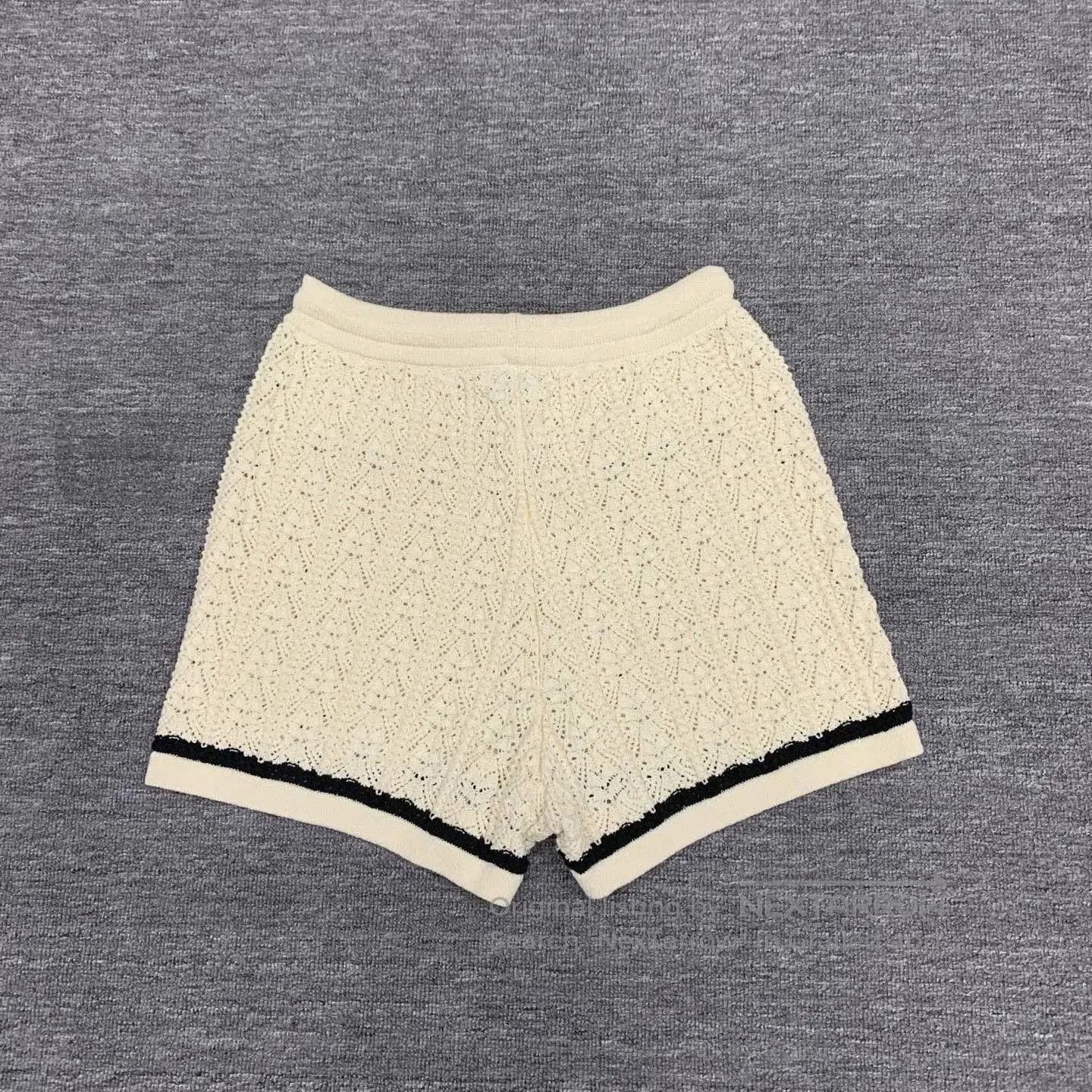 Chanel beige embroidered logo knit shorts. Size 35" - 2 Thumbnail