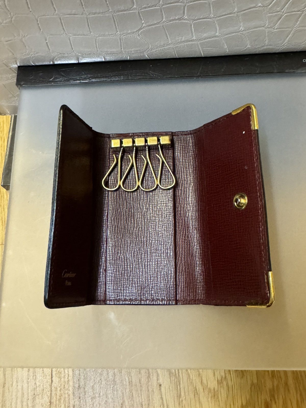image of Cartier Key Holder in Maroon, Men's