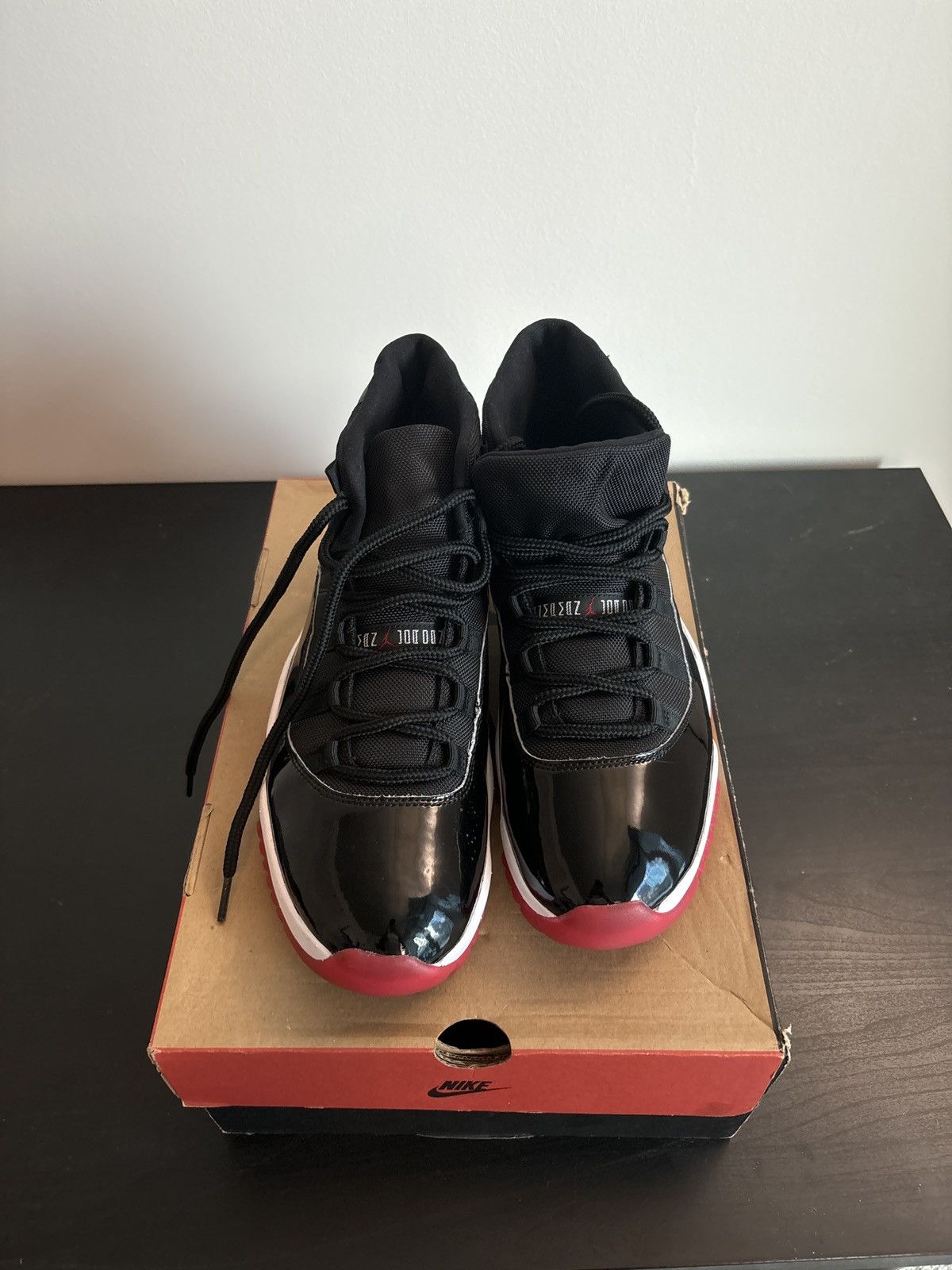 Jordan Brand Jordan 11 Bred Size US 12 / EU 45 - 1 Thumbnail
