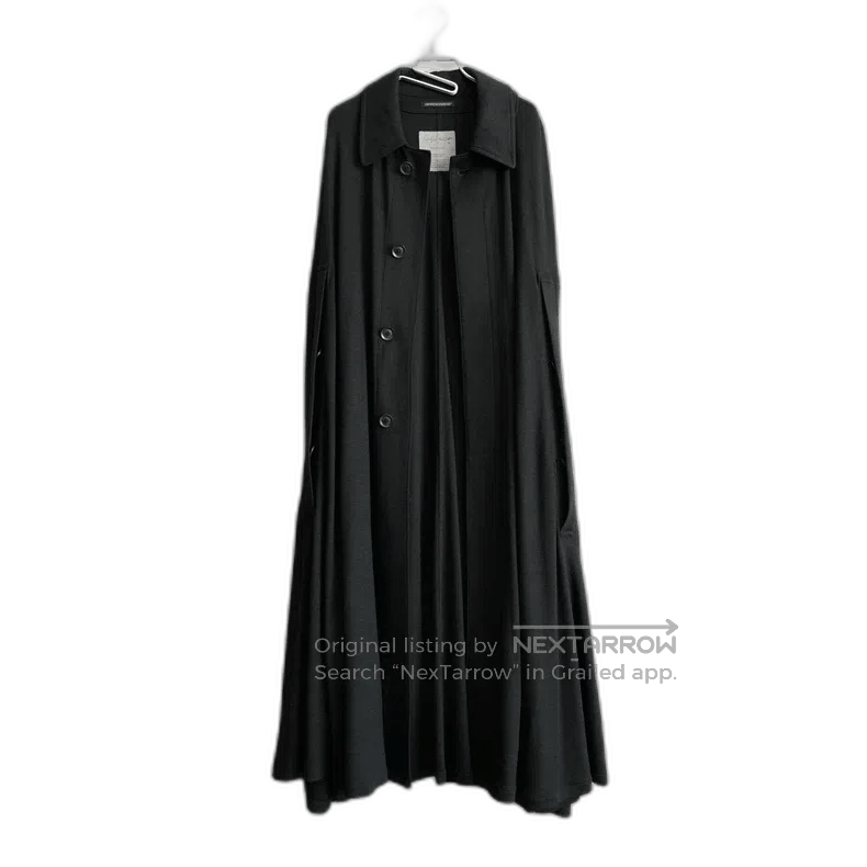 black wool cape coat by Yohji Yamamoto.