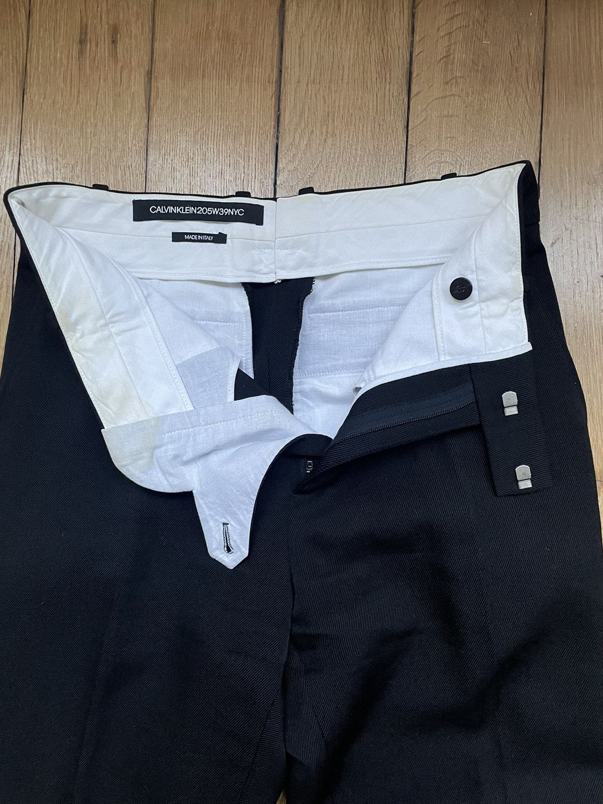 Calvin Klein 205W39NYC × Raf Simons Calvin Klein x Raf Simons Black Side Snaps Wool Trousers Size US 28 / EU 44 - 9 Thumbnail