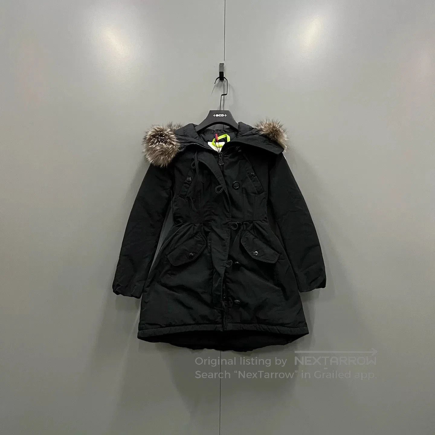 black belted down jacket with fur collar.