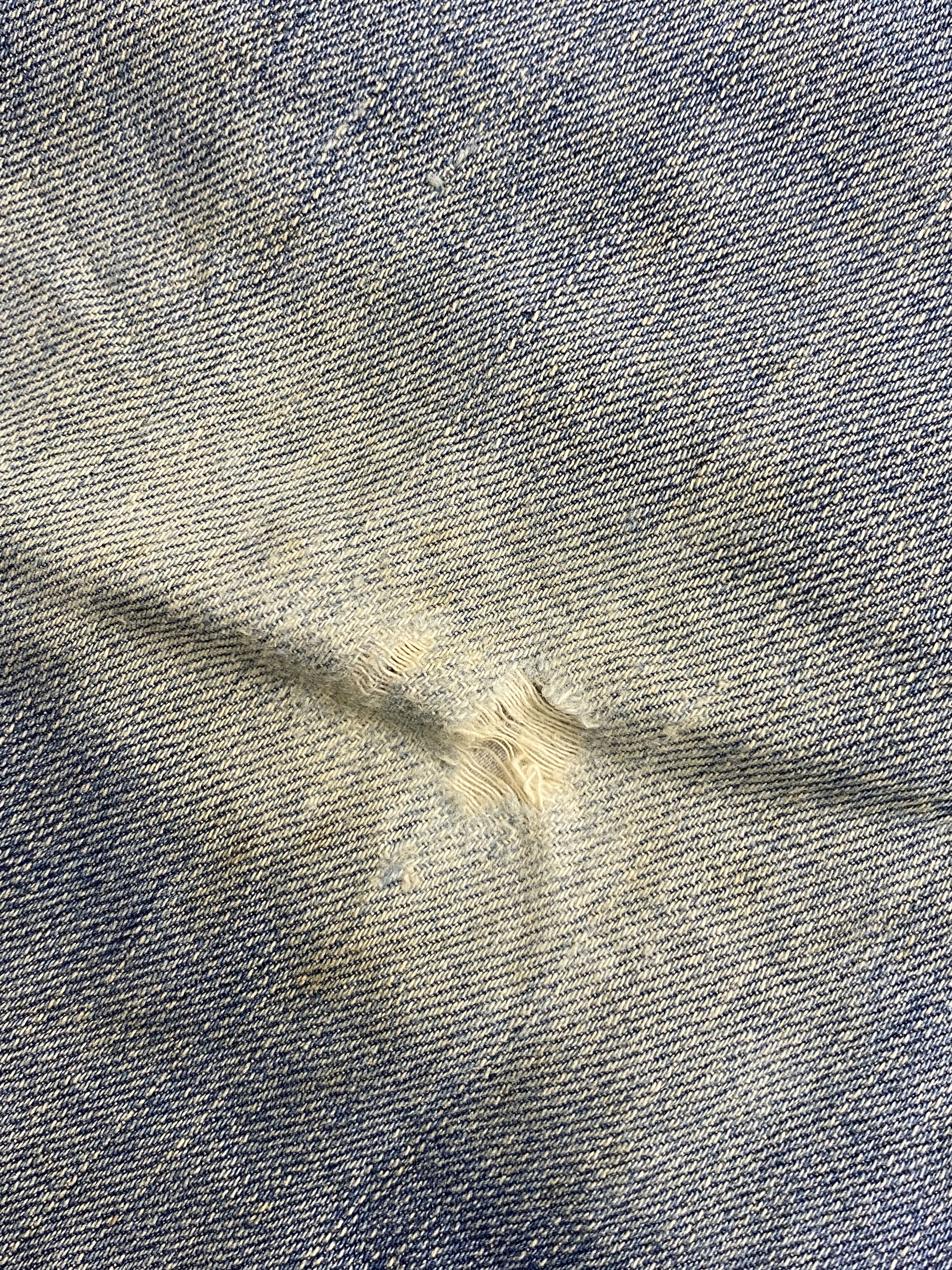 Distressed Vintage Levi's 514 Faded Blue Jeans