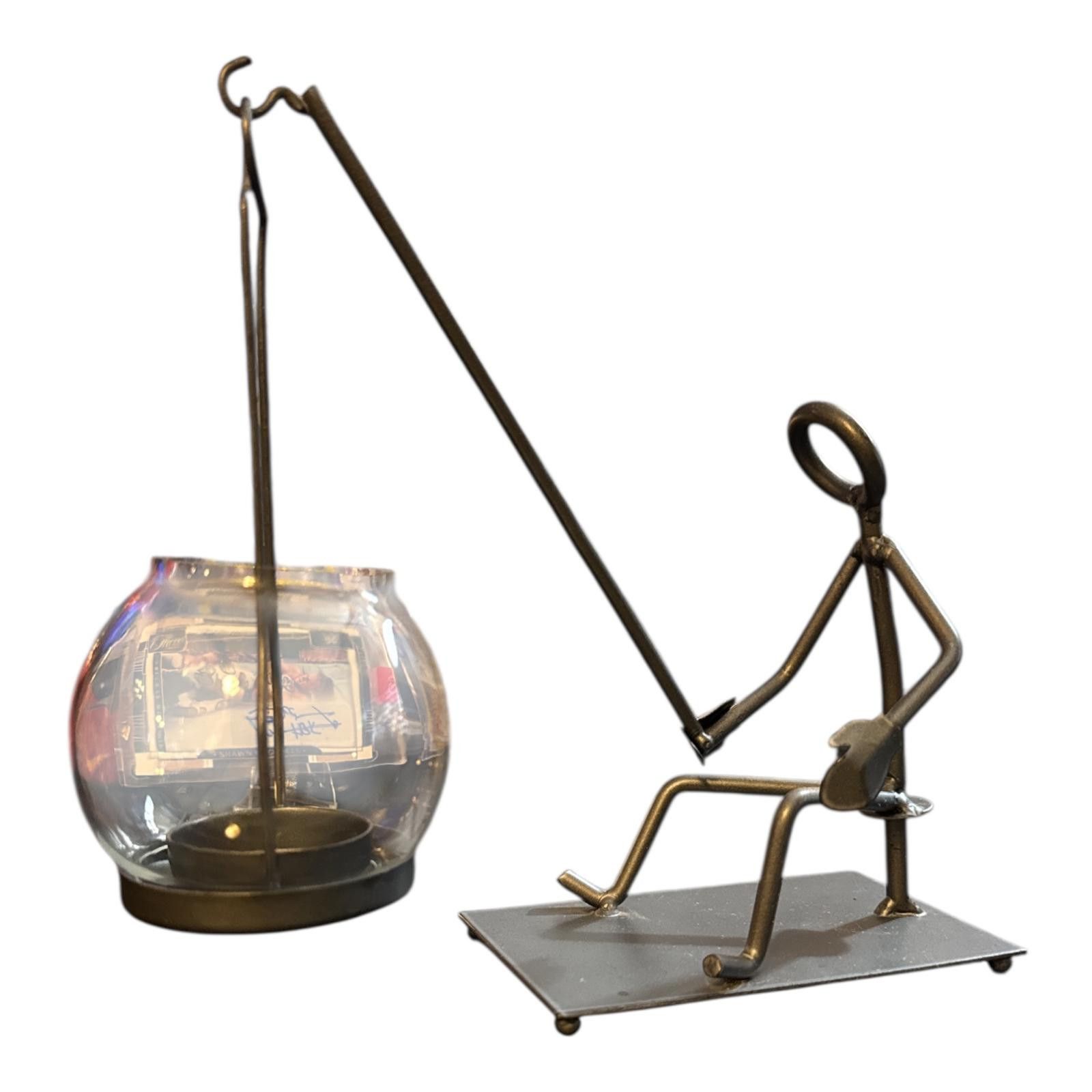 The Unbranded Brand Metal Fishing Figurine Candle Holder with Glass Bowl Size ONE SIZE - 1 Thumbnail