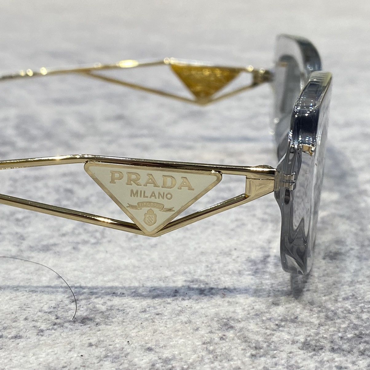 PRADA 0PR 14YS 12R50K TRANSPARENT GREY