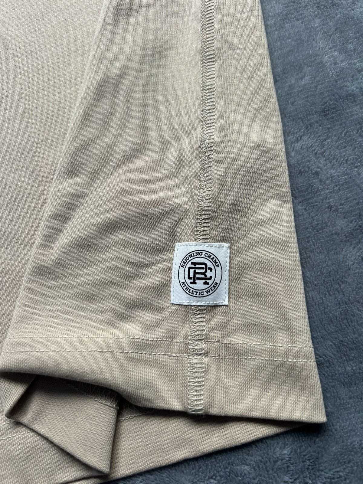 Reigning Champ Reigning Champ Short Sleeve Football T-Shirt Dune — Size M Size US M / EU 48-50 / 2 - 14 Thumbnail