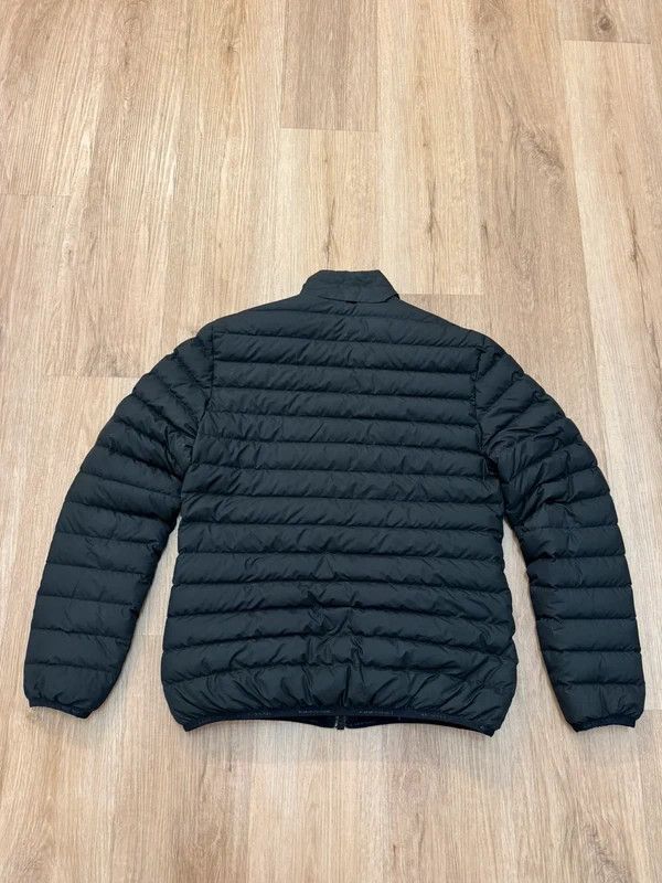 Peak Performance Peak Performance Troop Down Jacket Reversible size S Size US S / EU 44-46 / 1 - 3 Thumbnail