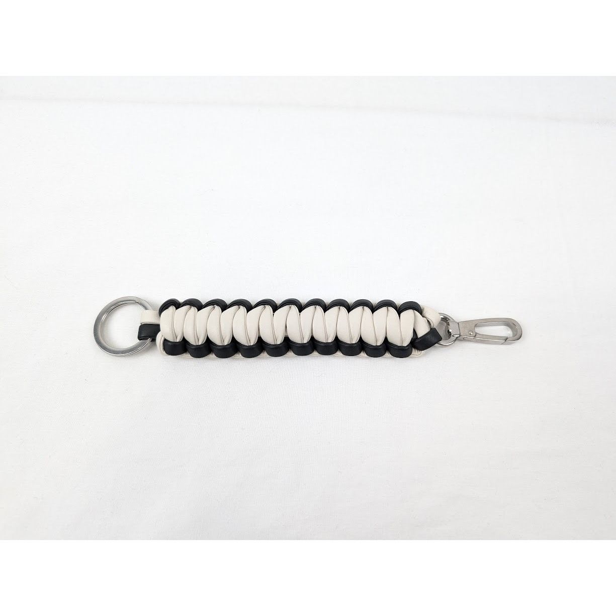 Bottega Veneta o1rshd1 Size: OS / Matt Calf Key Ring in Plaster/Nero Size ONE SIZE - 1 Thumbnail