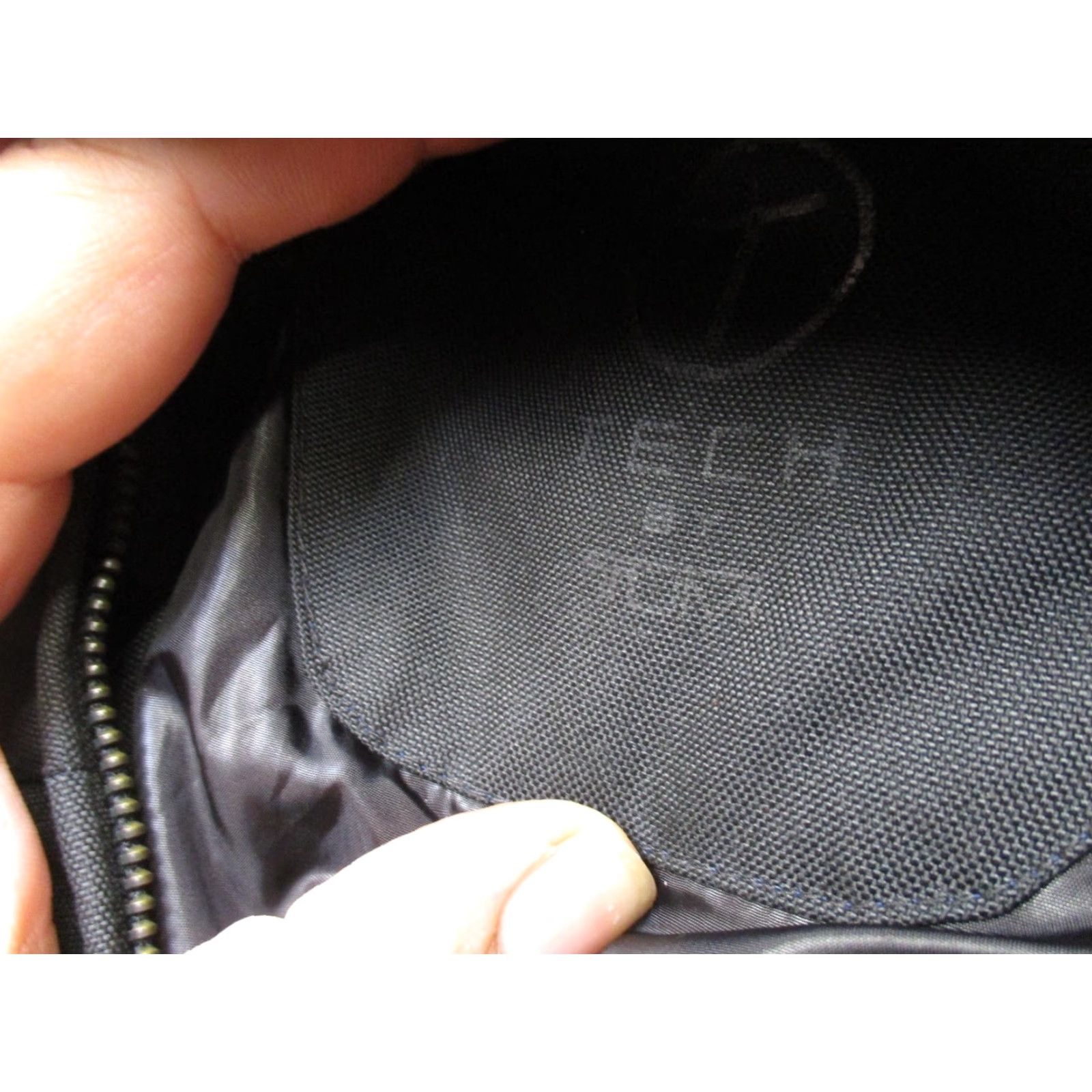 Tumi Tumi Coat Mens M Wool Black Quilted Lining Insulated Zip Pockets Tech Jacket Wool-Blend Pattern: Solid EST 1930s? (Oops) Size US M / EU 48-50 / 2 - 4 Thumbnail