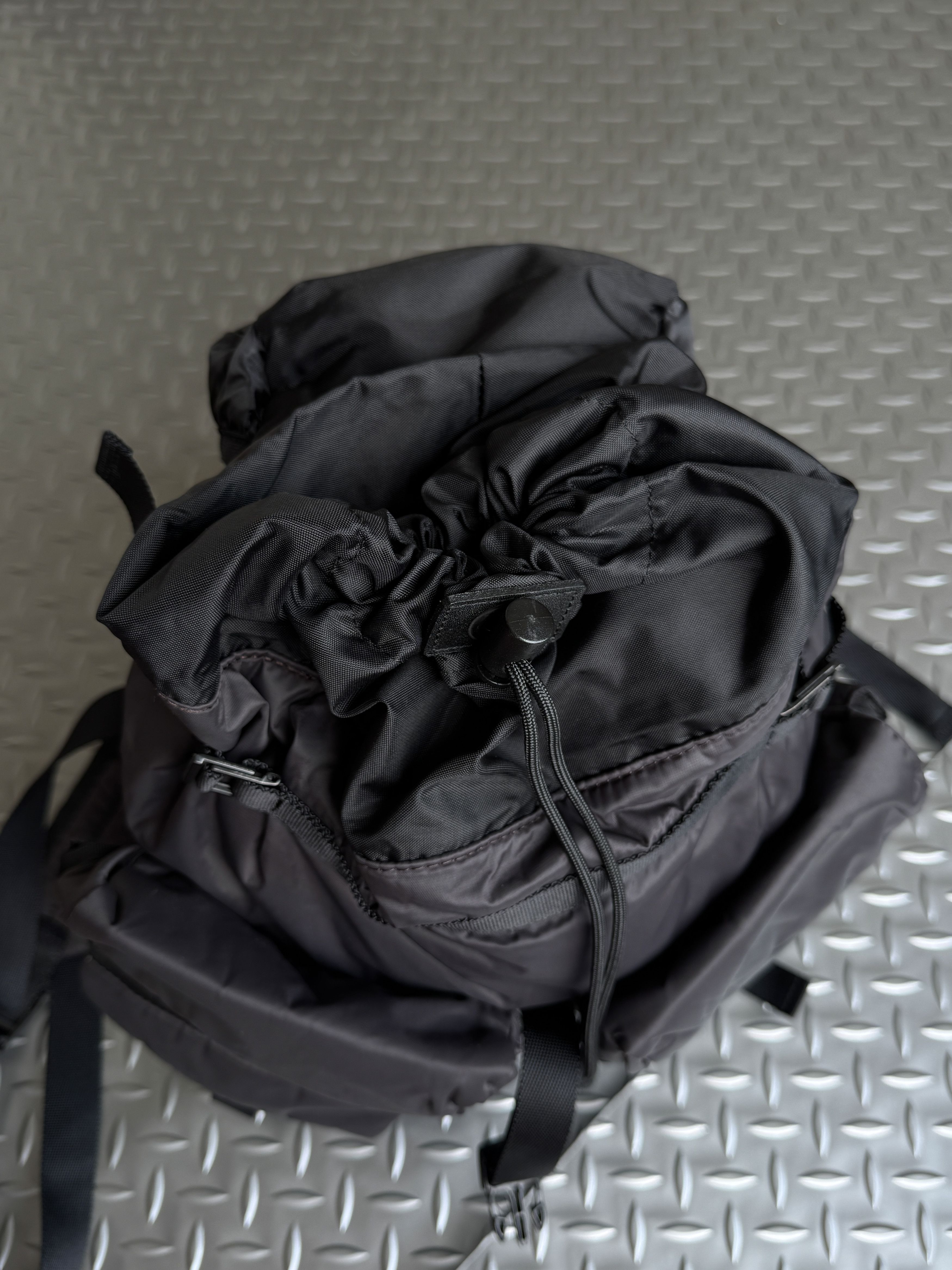A.I.P Multi-Pocket Puffer Backpack