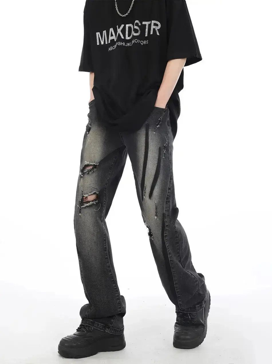 Gradient black striped distressed jeans