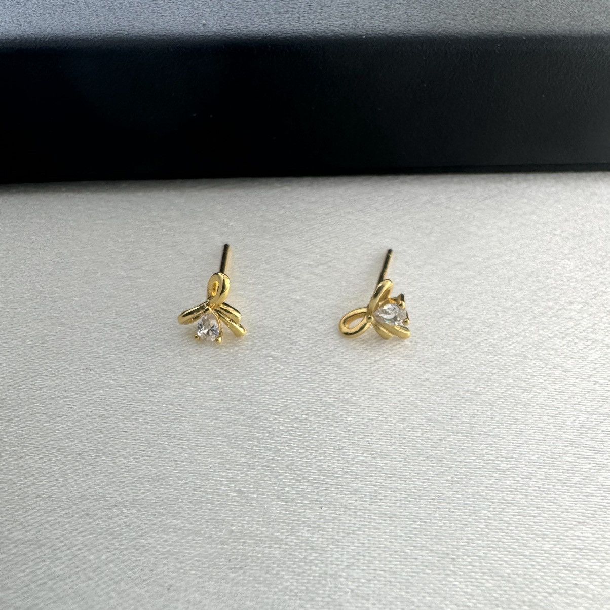 Designer Small CZ Bow Stud Earrings for Women Size ONE SIZE - 1 Thumbnail