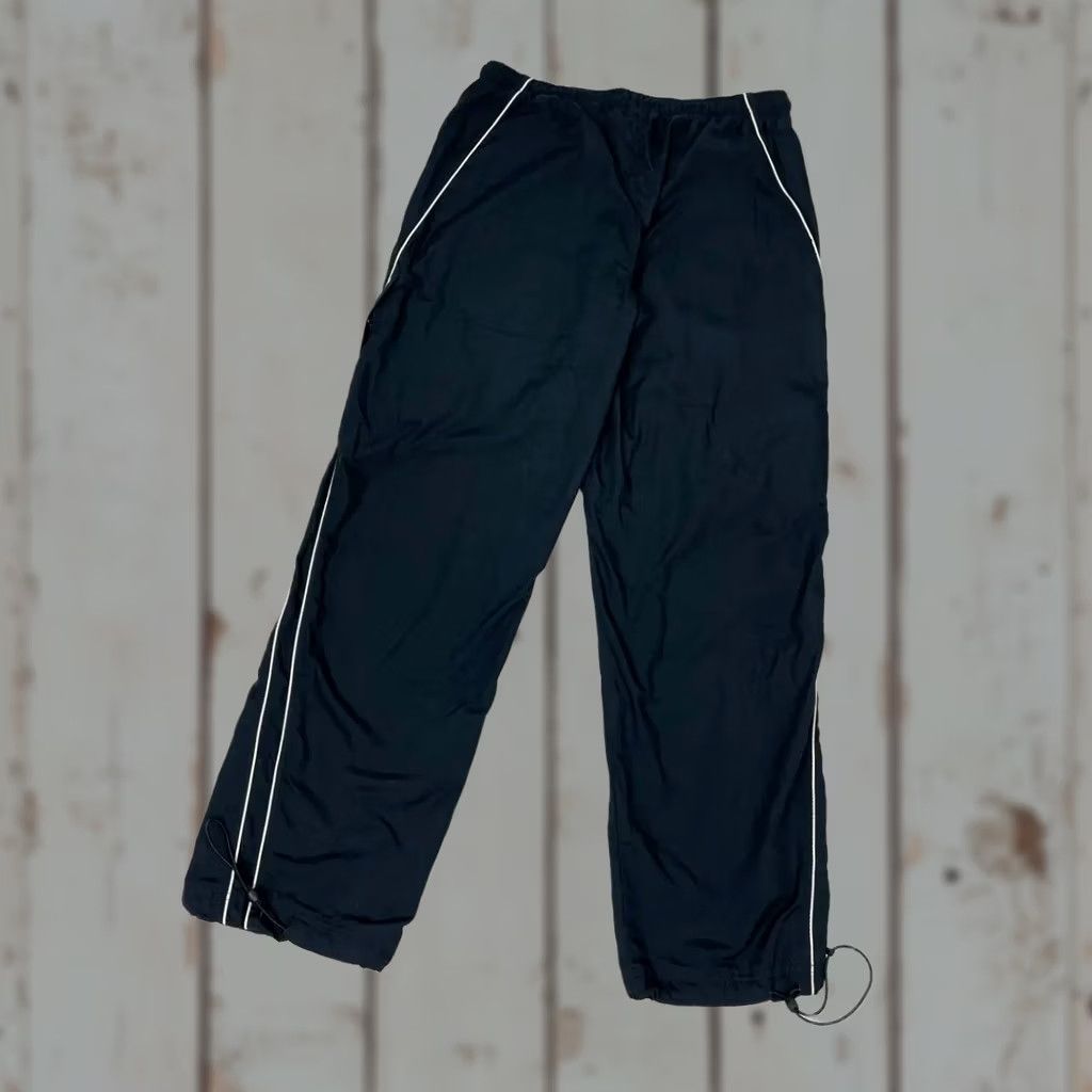 Nike VINTAGE Nike Track Pants Nylon Swoosh Striped Baggy Men XL Black Size US 36 / EU 52 - 1 Thumbnail