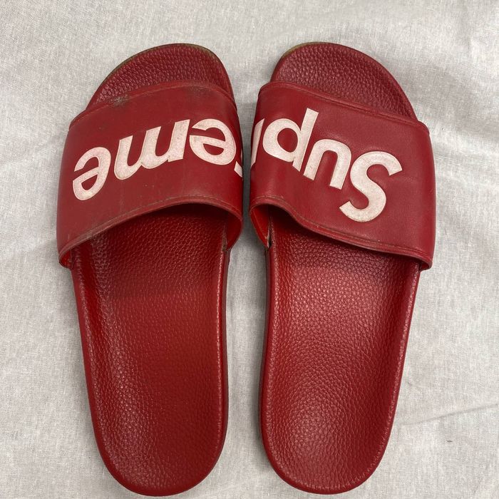 Red supreme best sale flip flops