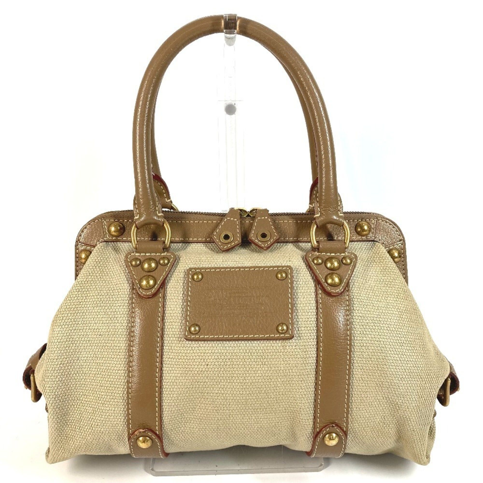 LOUIS VUITTON Toal Trianon Sac de Nuit MM M48826 a tote bag/shoulder bag/handbag in canvas and leather beige.