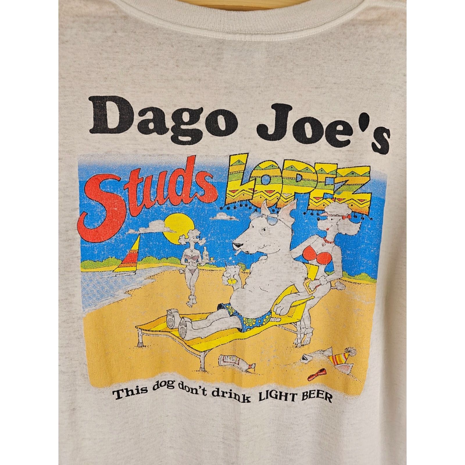 Vintage DAGO JOE'S STUDS LOPEZ THIS DOG DON'T DRINK LIGHT BEER T-SHIRT XL VINTAGE 80' SHIRT Mens White Cotton Short Sleeve Crew Neck Size US XL / EU 56 / 4 - 2 Thumbnail