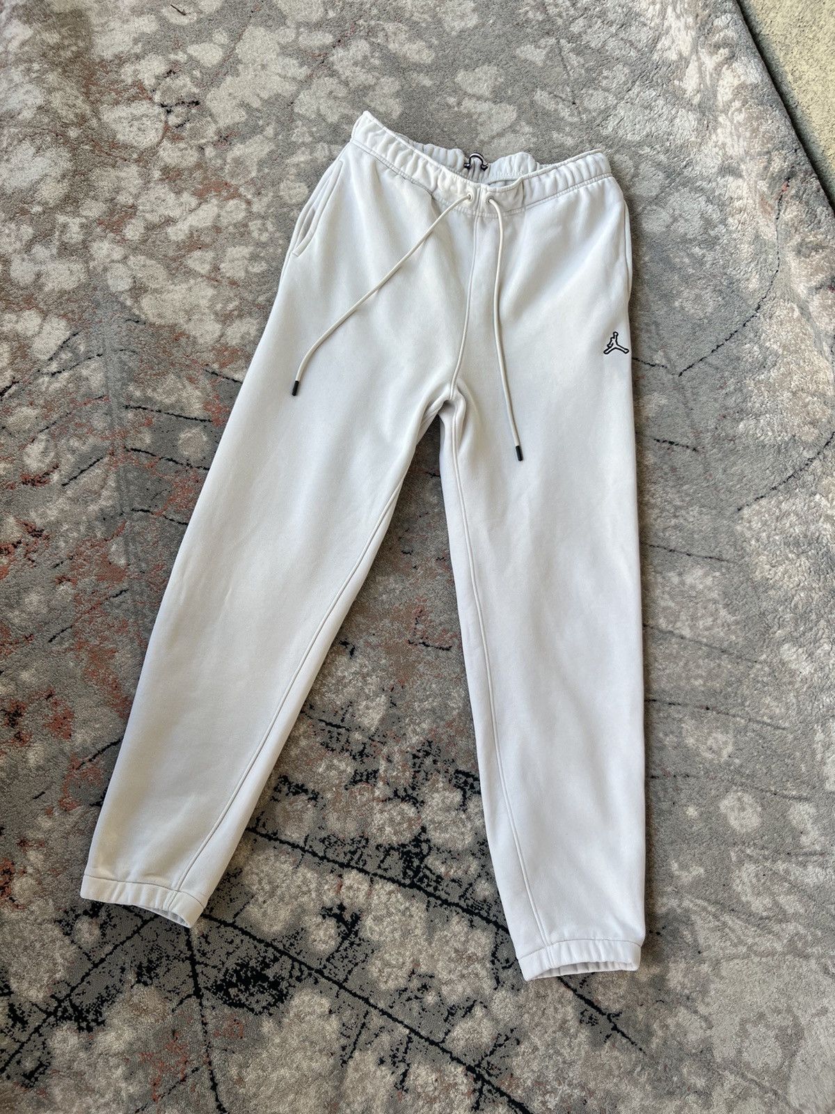 image of Jordan Brand Essentials Fleece Joggers Sweatpants in Beige, Men's (Size 34)