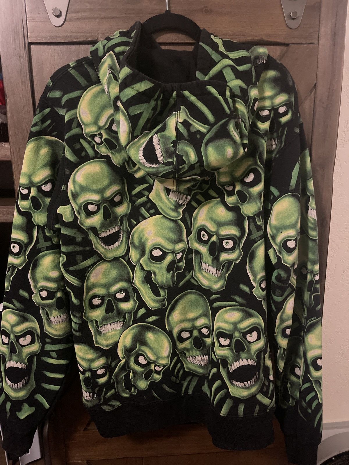 Supreme green best sale skull hoodie