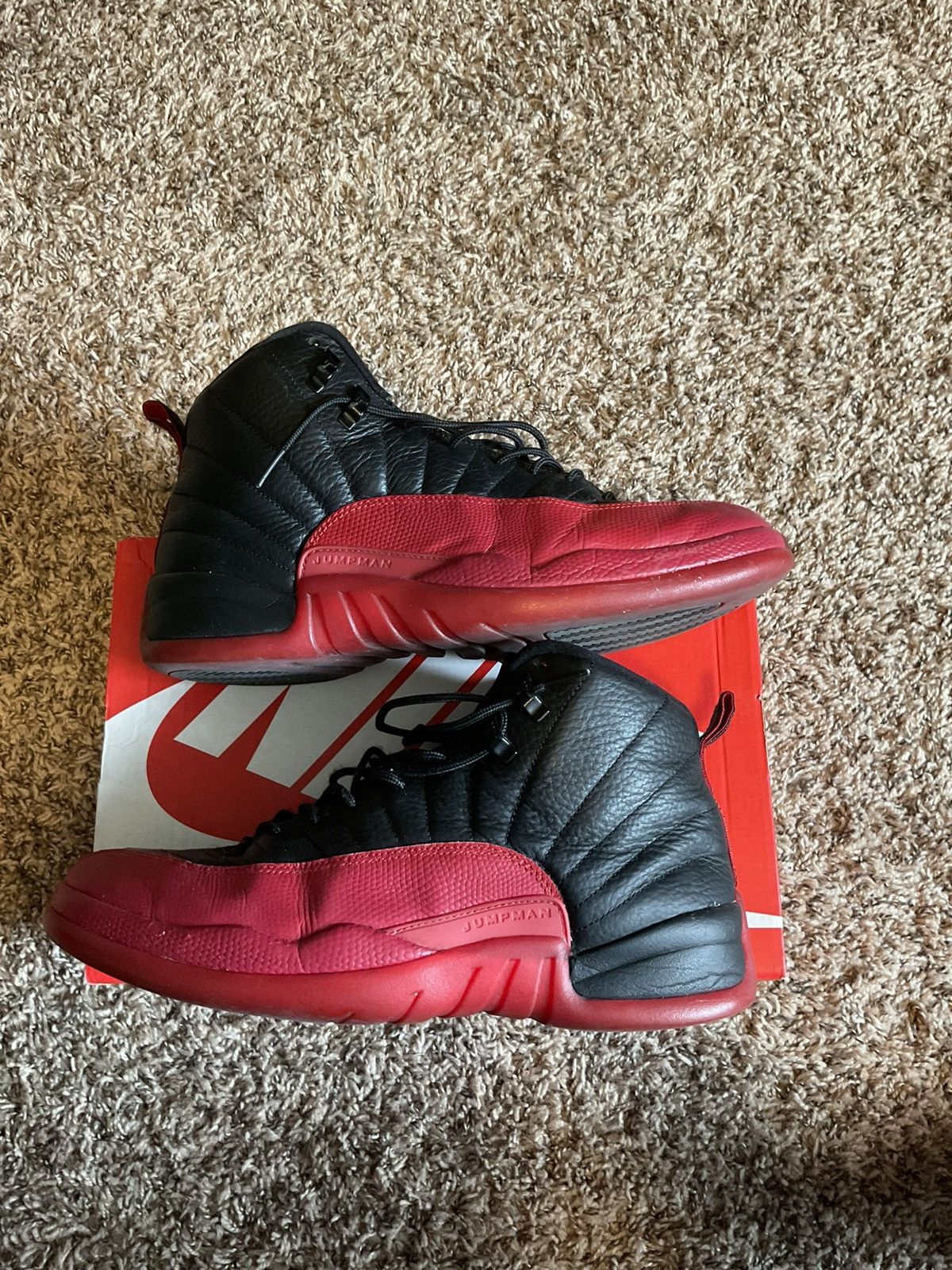 image of Air Jordan 12 Retro Flu Game 2016 Shoes in Black/Red, Men's (Size 11)