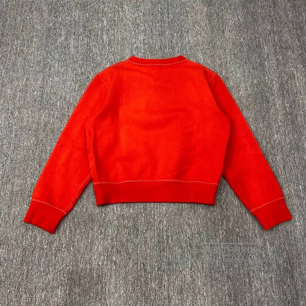 red limited edition knit sweatshirt.