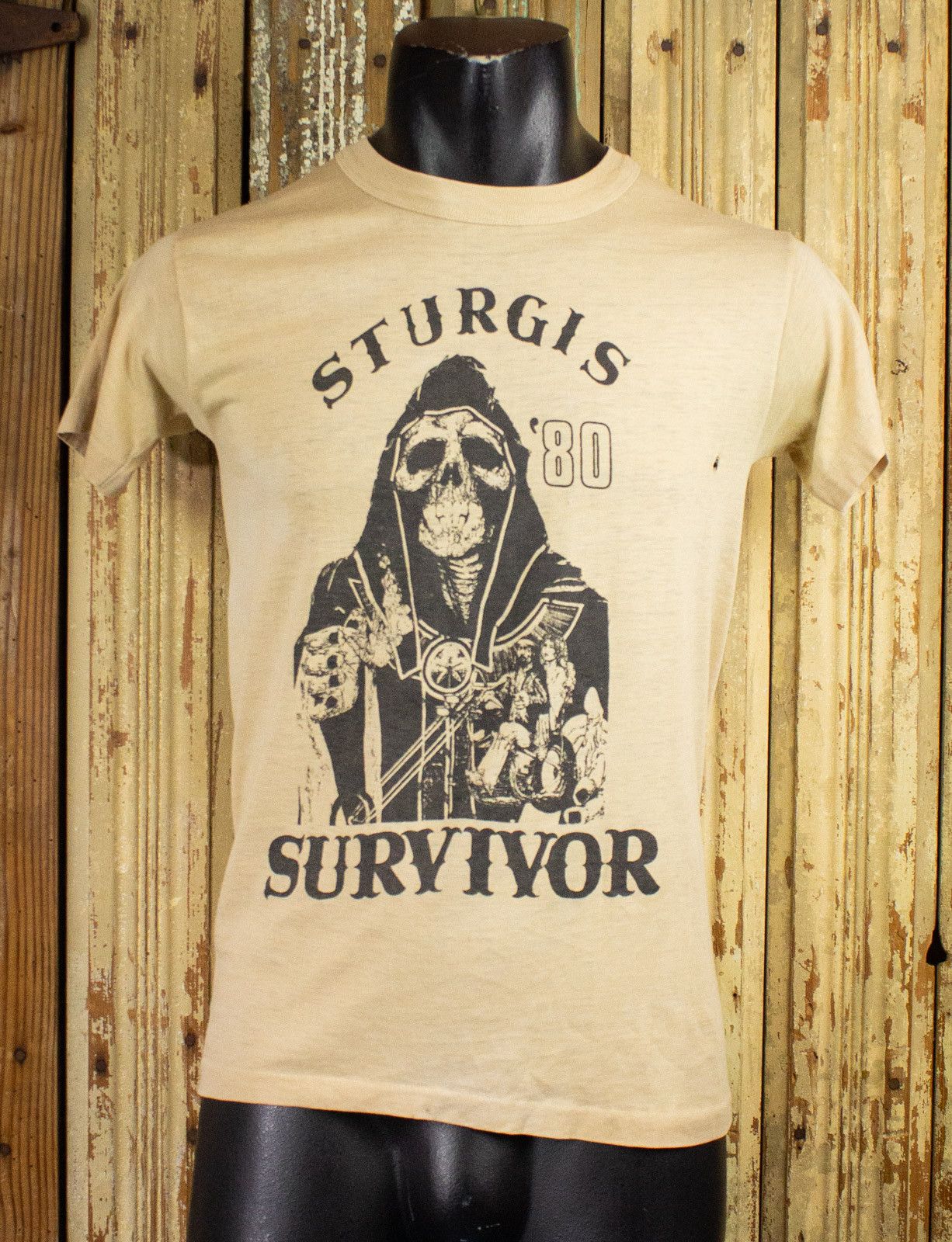 image of Vintage Sturgis Survivor Graphic T Shirt 1980 in Tan, Men's (Size Small)