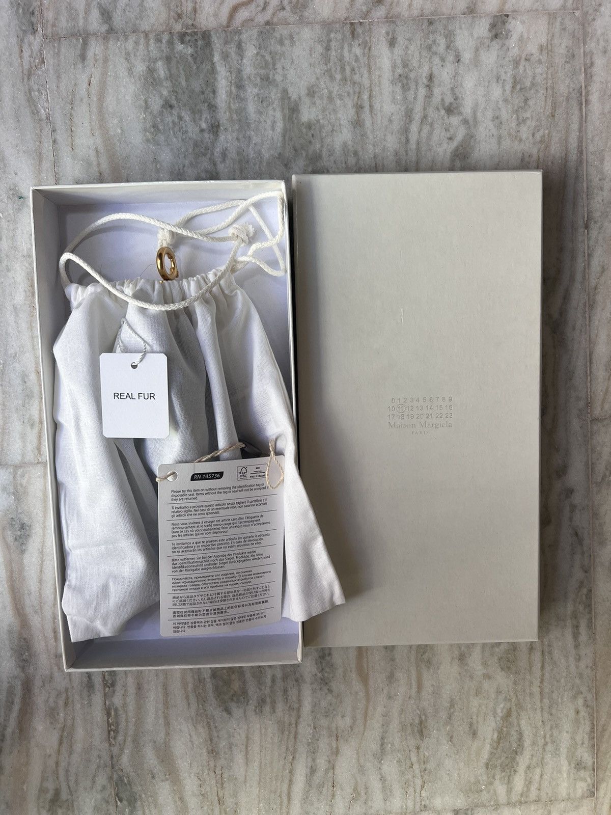 Maison Margiela charm pierce 【sample】 Buy Maison Margiela women silver replica keyring for €175