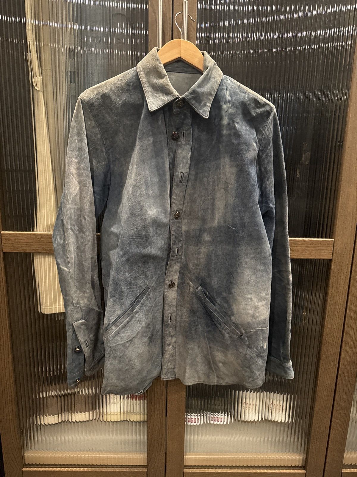 Chrome hearts blue 1/1 leather shirt with silver buttons.