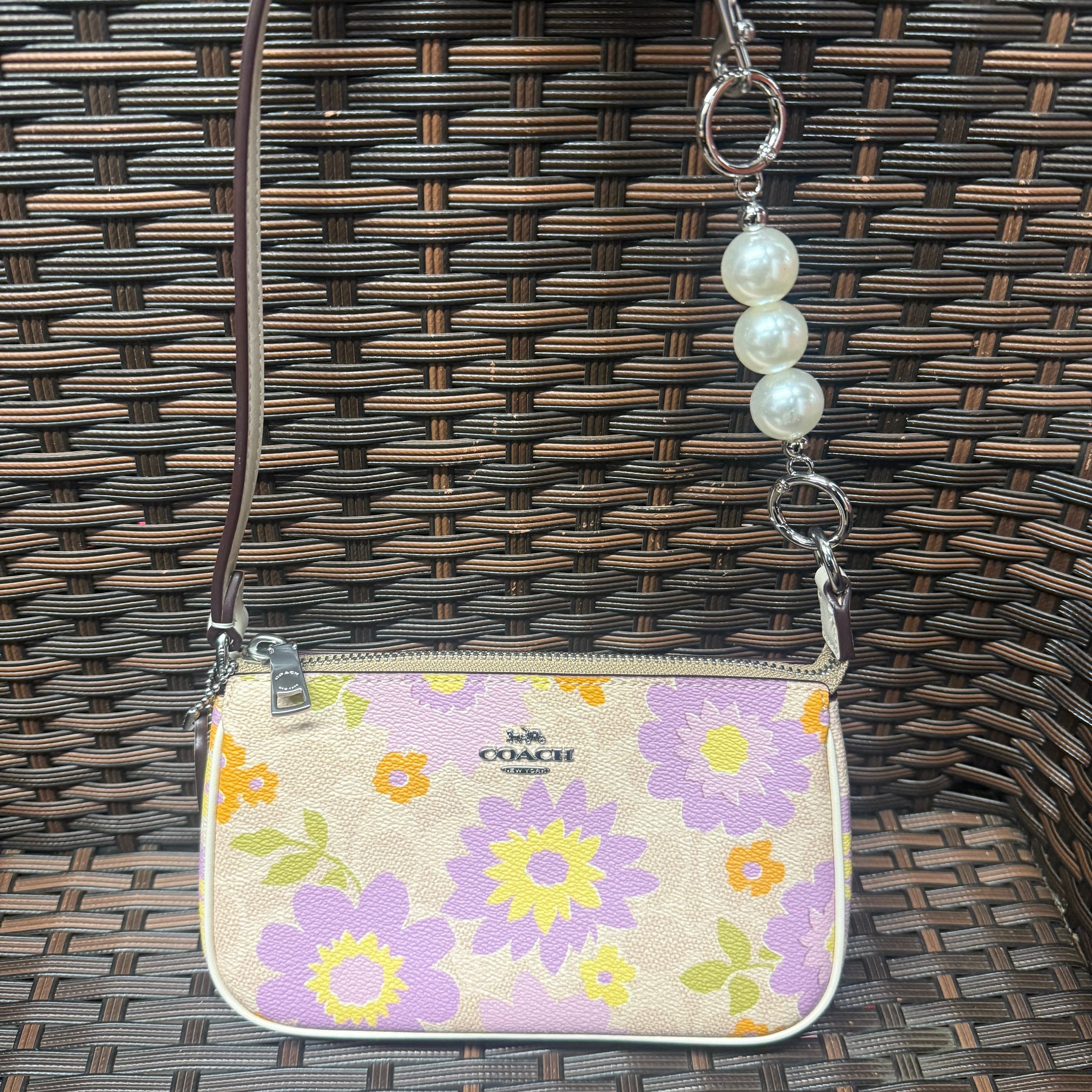 coach Nolita 19 In Signature Canvas With Floral Print cbm73