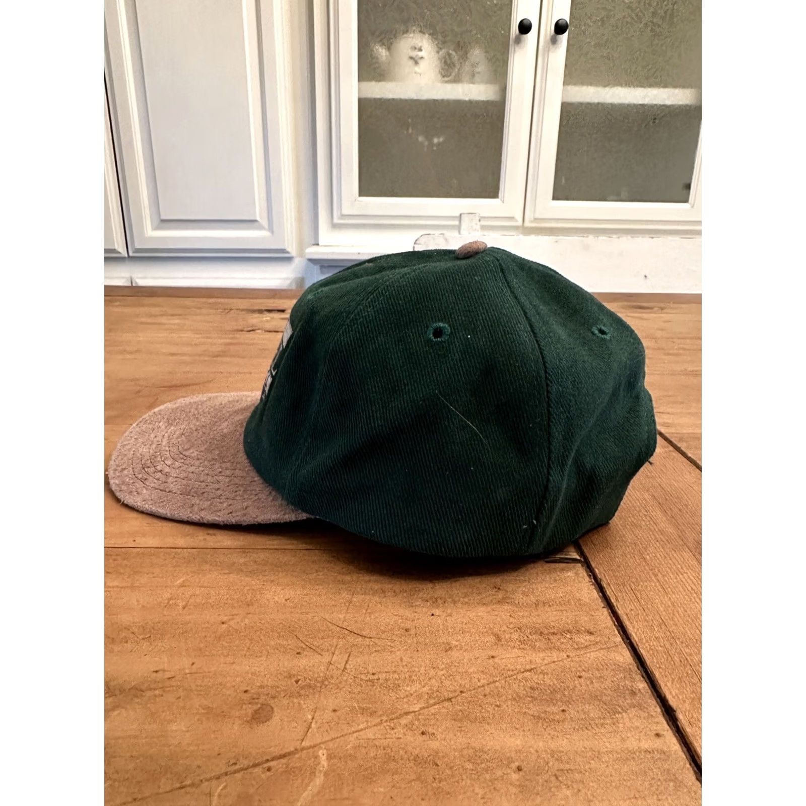 Chanel VINTAGE CapAmerica Travel Channel Logo Green Embroidered Leather Strap Back Hat Men Adjustable Beige Leather Baseball Cap Logo Travel Theme Mens Size ONE SIZE - 2 Thumbnail