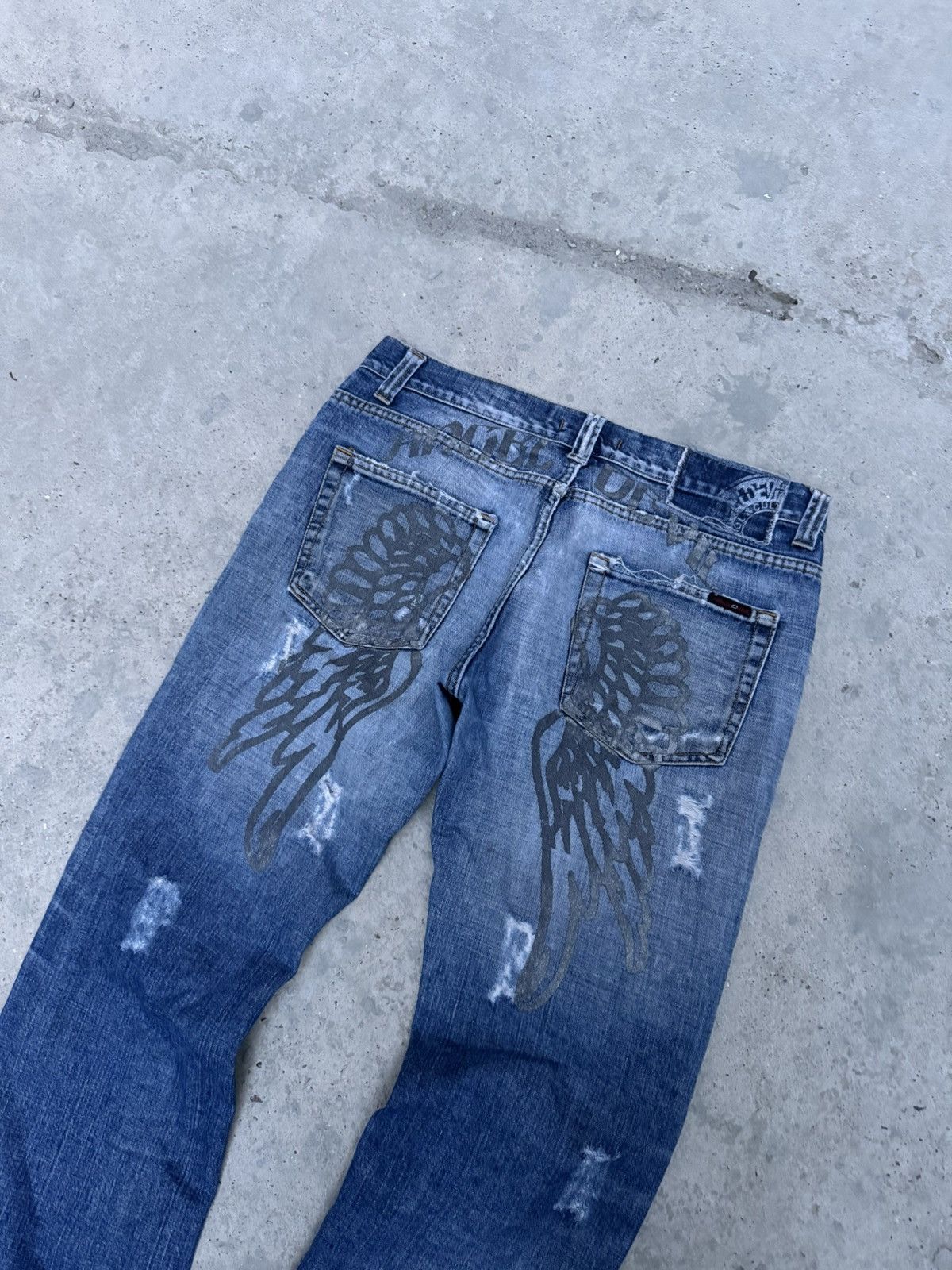 VINTAGE DISTRESSED WINGS DENIM JEANS