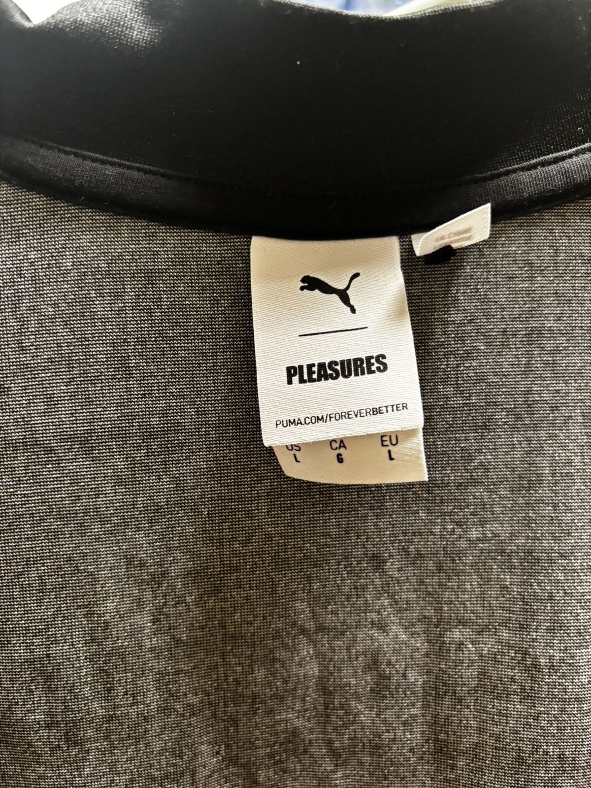 Pleasures × Puma Black Base Layer Puma x Pleasures Size US L / EU 52-54 / 3 - 6 Thumbnail