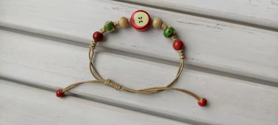 Jewelry Handmade Apple Ceramic Bracelet Adjustable Woven Cord Size ONE SIZE - 1 Thumbnail