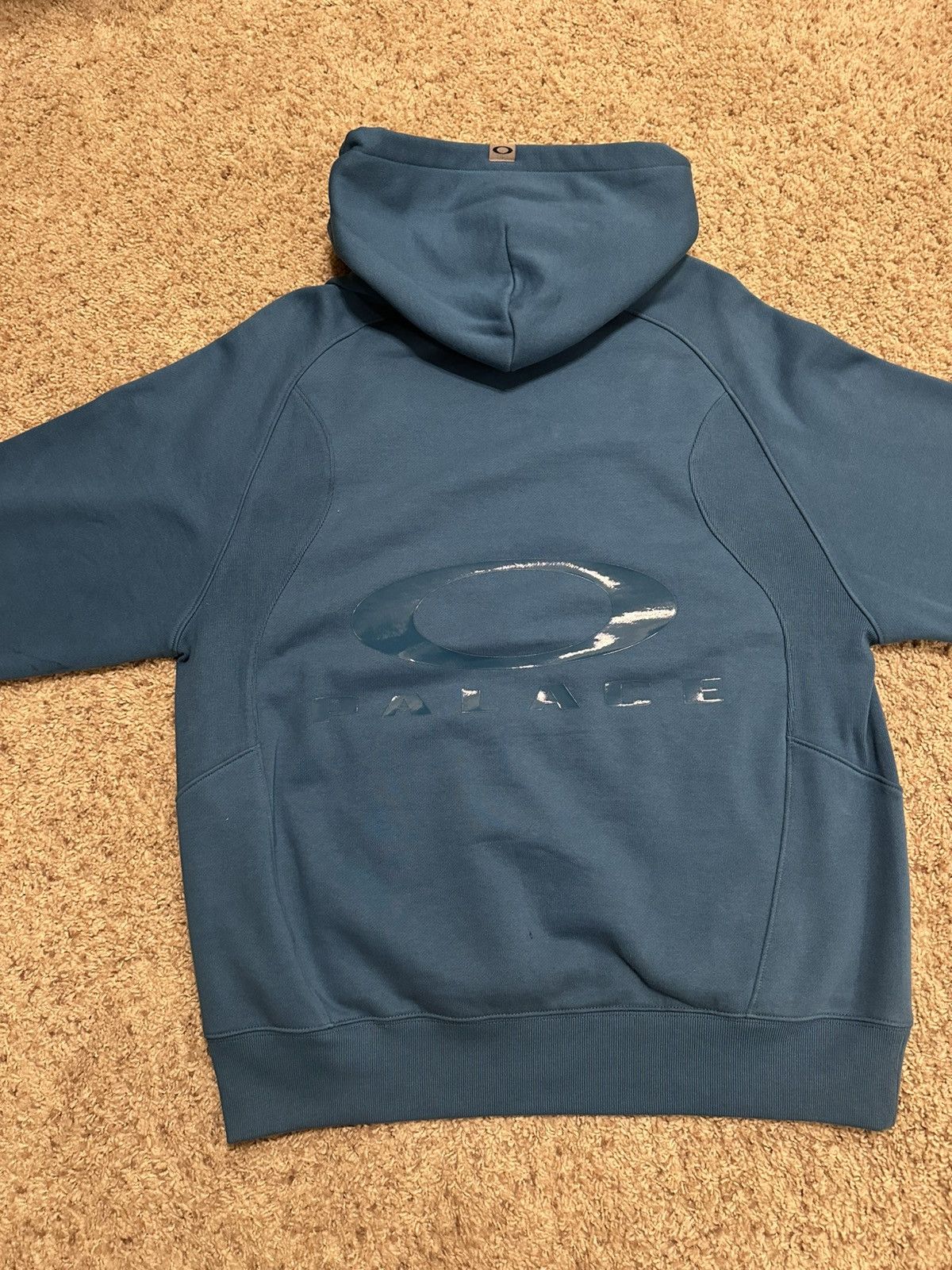 Oakley × Palace PALACE X OAKLEY HOODED SWEATSHIRT BLUE SIZE LARGE Size US L / EU 52-54 / 3 - 4 Thumbnail