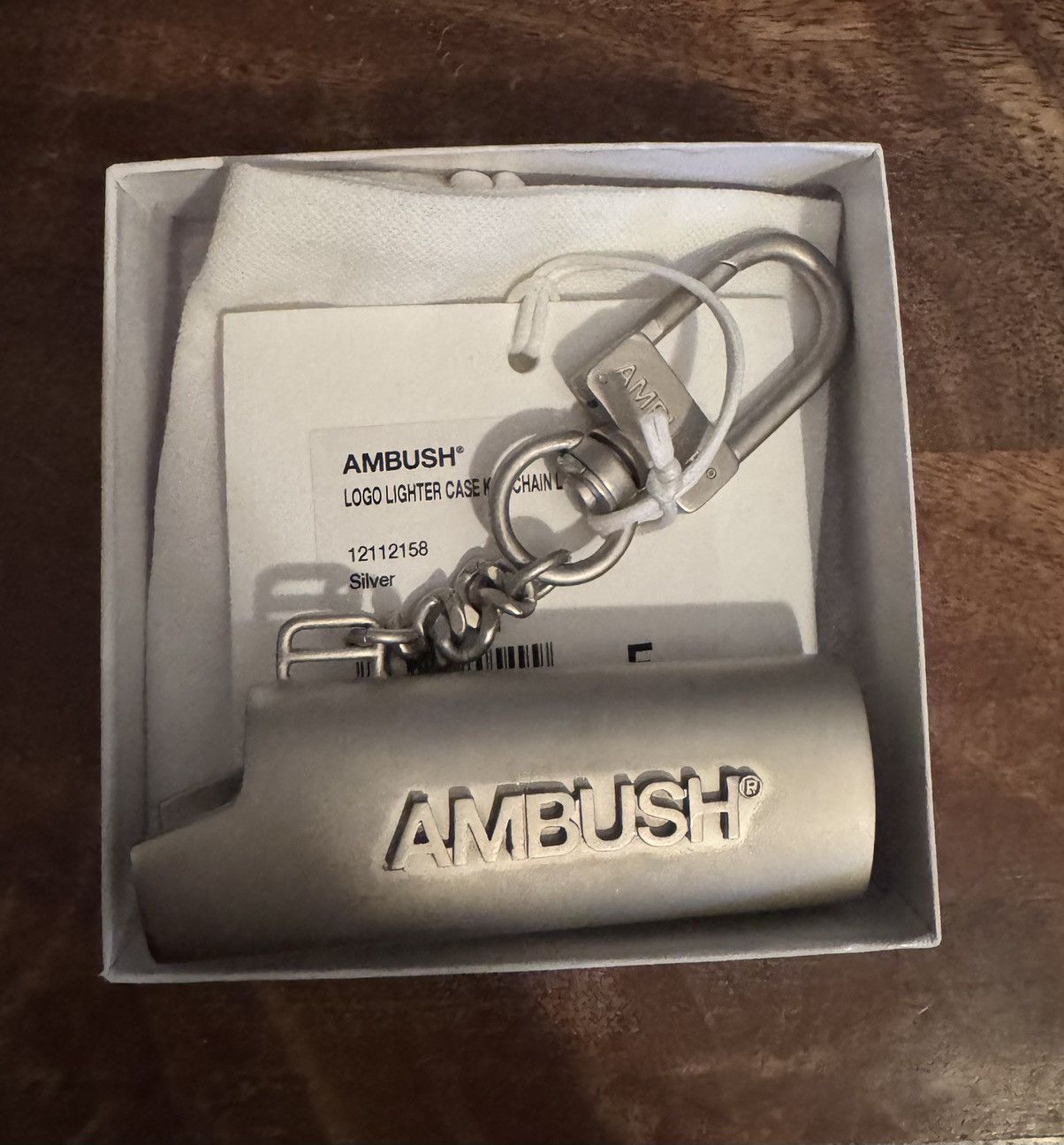 Ambush Design Ambush Logo Lighter Case Key Chain L Silver, 12112158, New Size ONE SIZE - 1 Thumbnail