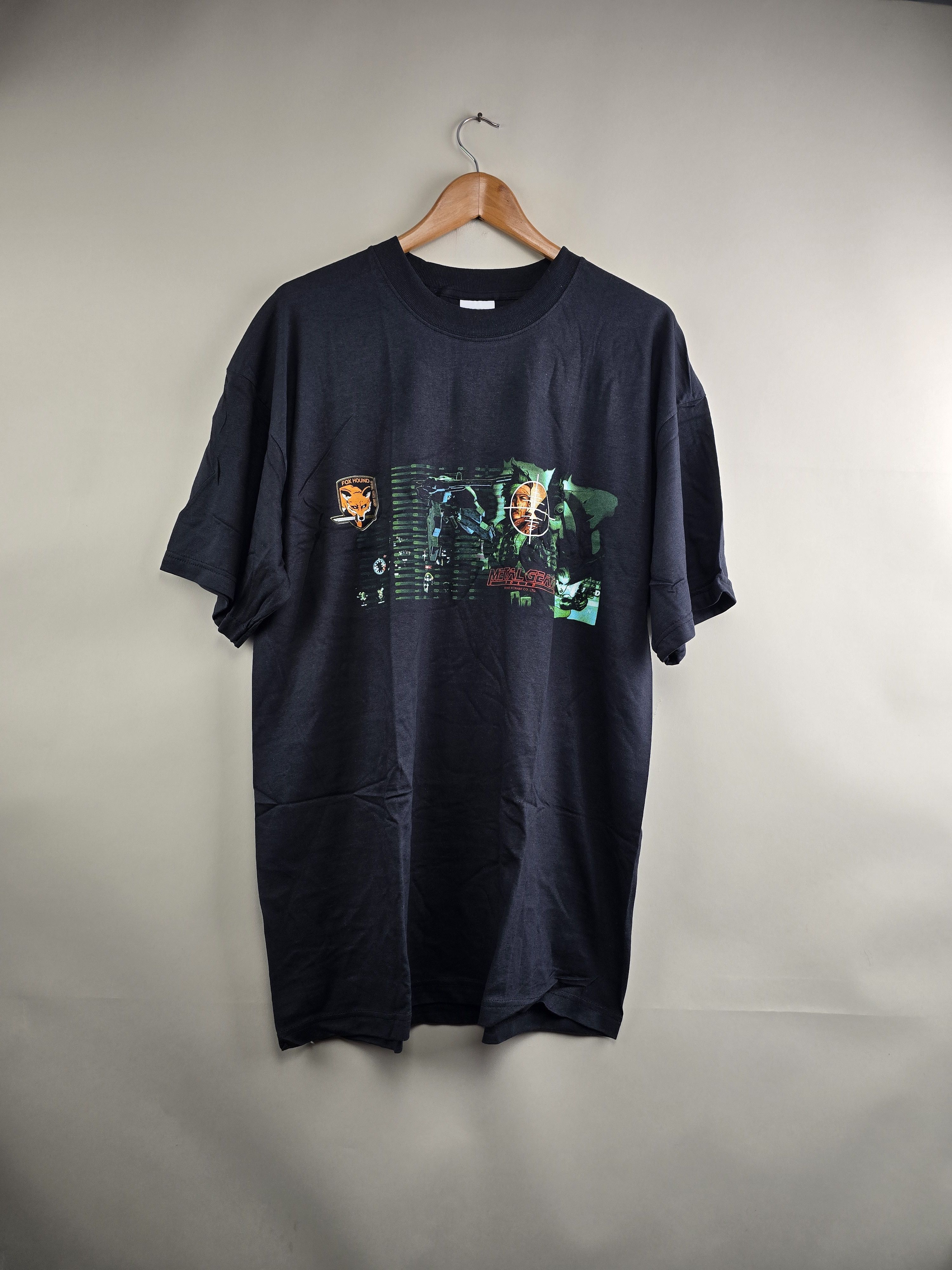 Anime × Microsoft × Vintage 2000 Konami Metal Gear Solid Gaming Anime tee XL 24" 32" Size US XL / EU 56 / 4 - 6 Thumbnail