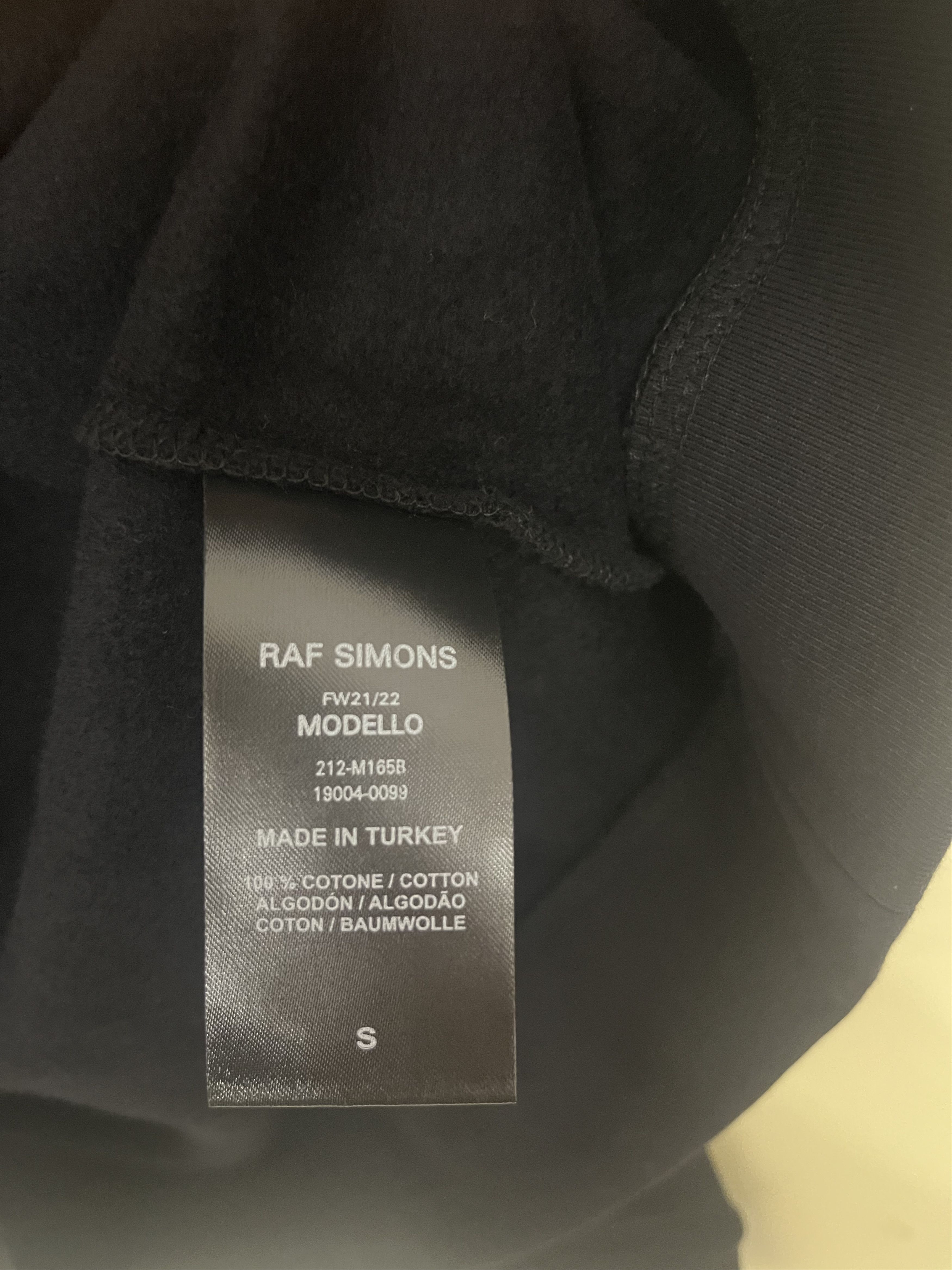 Raf Simons Raf Simons “Synchronicity” Print Hoodie – Black – Size S Size US S / EU 44-46 / 1 - 9 Thumbnail