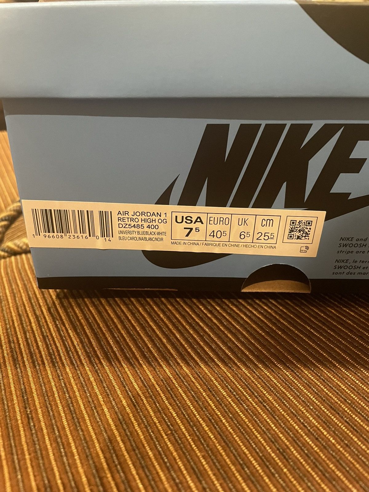 image of Nike Jordan 1 Unc Shoes in Blue, Men's (Size 7.5)